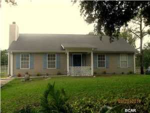 Exceptional Modern Home....Quiet Country Living! This home has updated appliances and the open floor plan just makes sense and feels larger than expected. This home has been well cared for and it shows throughout. Tastefully decorated with earth tone colors and all bedrooms are large. Cozy fireplace for those cool evenings. Very large screened in porch that is a great place for family entertaining and relaxing. And to make it all come together over a half acre on a pond being fed by Bear Creek for those who enjoy fishing. No dirt roads and a country atmosphere..the best of both worlds. Come and see for yourself..you won't be disappointed!