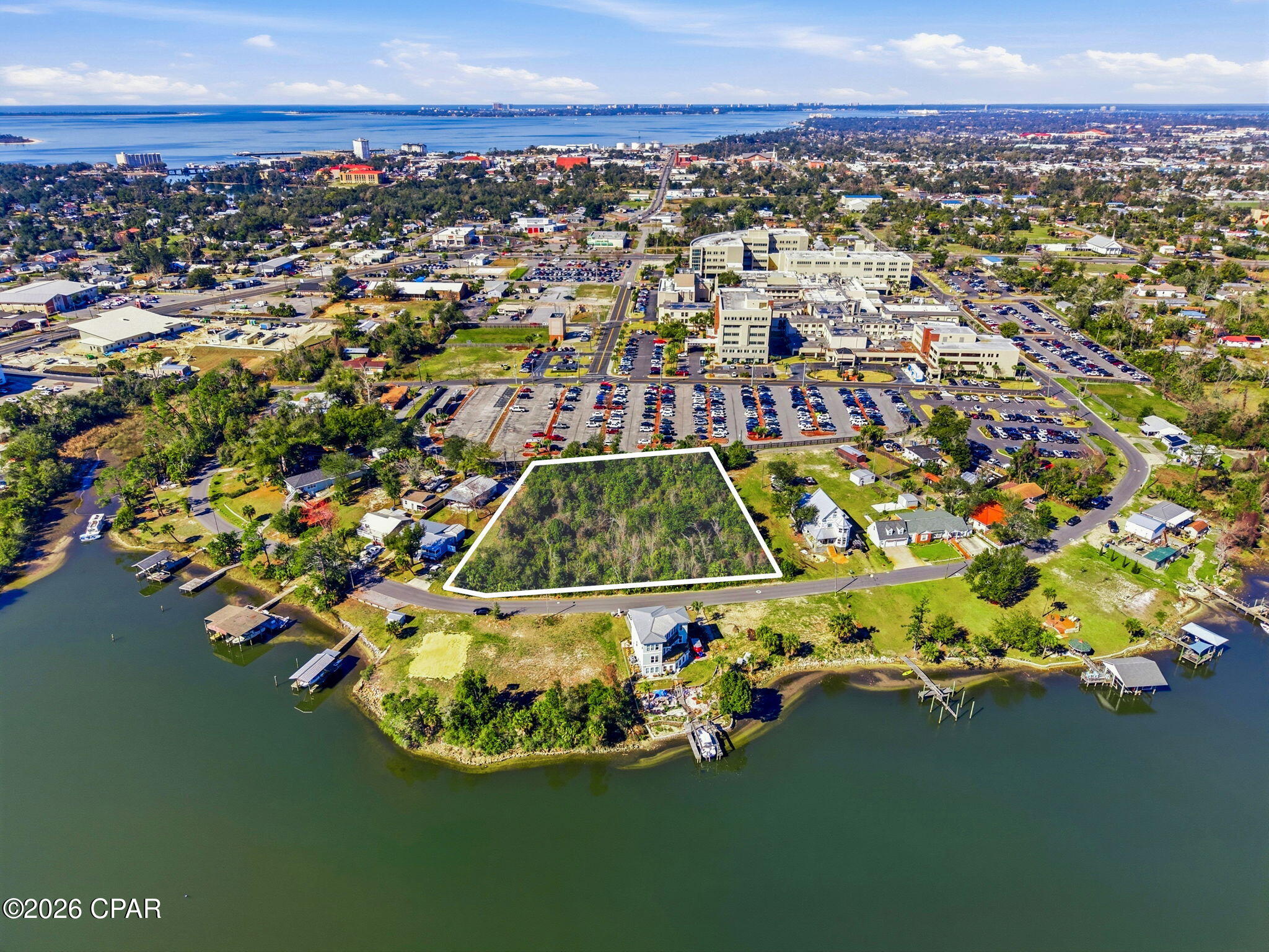 1.637-acre commercial lot on La Paloma Trail in Panama City, FL! This undeveloped parcel sits directly across the street from the water, providing a scenic backdrop and excellent visibility. Ideal for commercial development, the lot offers ample space for building and parking while taking advantage of a high-traffic, growing area. A rare opportunity to secure a prime location with strong development potential.