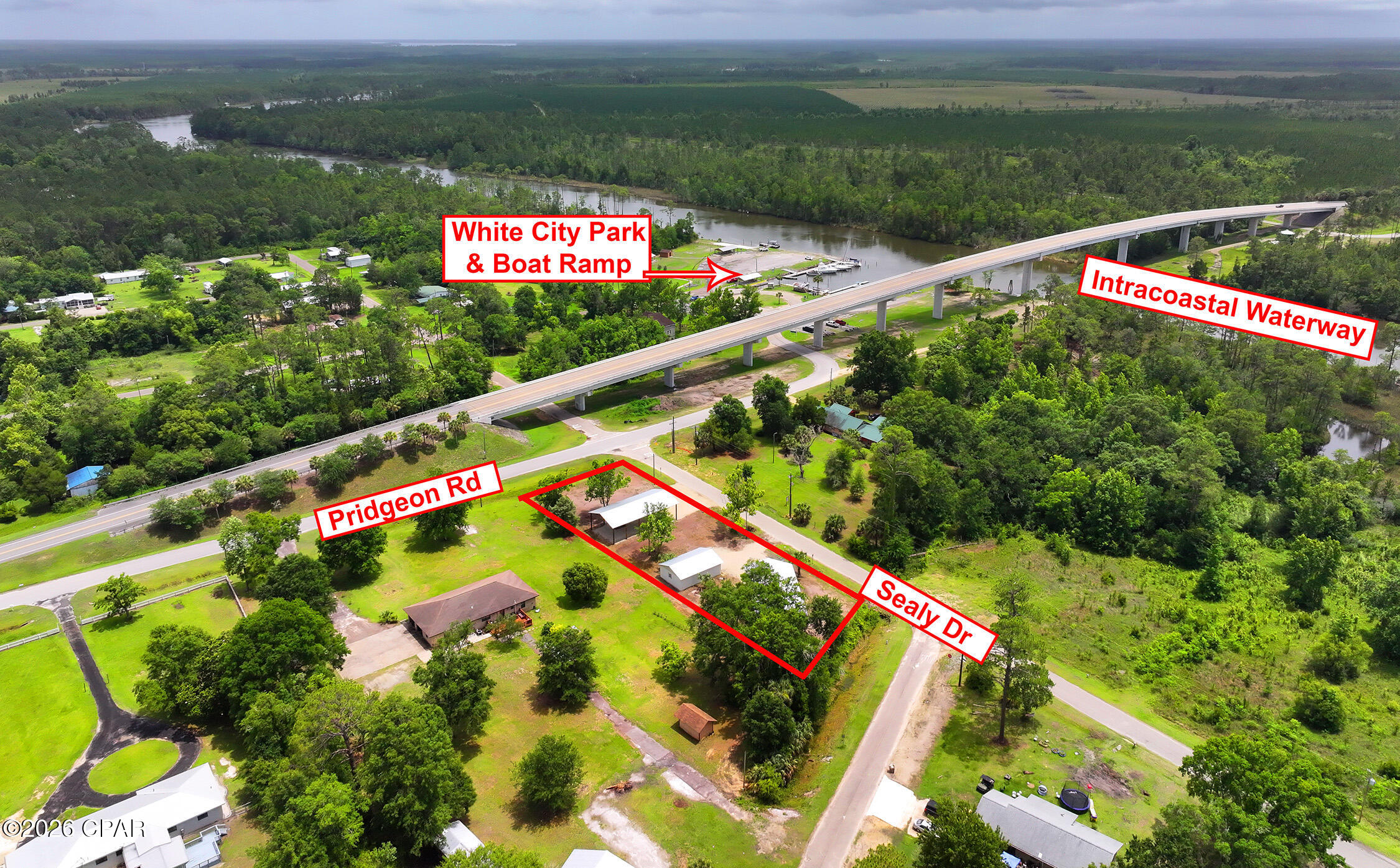 Own Your Piece of Florida's Forgotten Coast. Discover a rare opportunity to purchase two neighboring RV Approved Lots totaling .71 acres here in beautiful Gulf County, Florida. Located just 7 miles from Port Saint Joe and 600 feet from the White City Public Boat Ramp. These improved lots are ideal for Full-time RV living, vacation getaways, and rental income opportunities. Located in an X Flood Zone (no flood insurance required should you ever choose to build), each lot has been meticulously finished to include 60x30 Pole Barns featuring 8x8 poles and 14 foot eaves, gravel pads and driveways, underground 100 amp utilities featuring both 50 amp and 30 amp hookups, county sewer, and city water. An added bonus is the lot at 167 features a 35x25 block building with a brand new metal roof, perfect for securely storing all your toys. Live on one and rent the other, rent both, or turn both into the ultimate RV home base. Located within 600 feet of the White City Public Boat Ramp, you can launch your boat onto the Intracoastal Waterway within minutes and enjoy world-class fishing and easy access to the Gulf.  Don't miss this opportunity to purchase these side by side RV Approved lots. *Each Lot is also individually available, see MLS #790773 and MLS #790776 for details.*