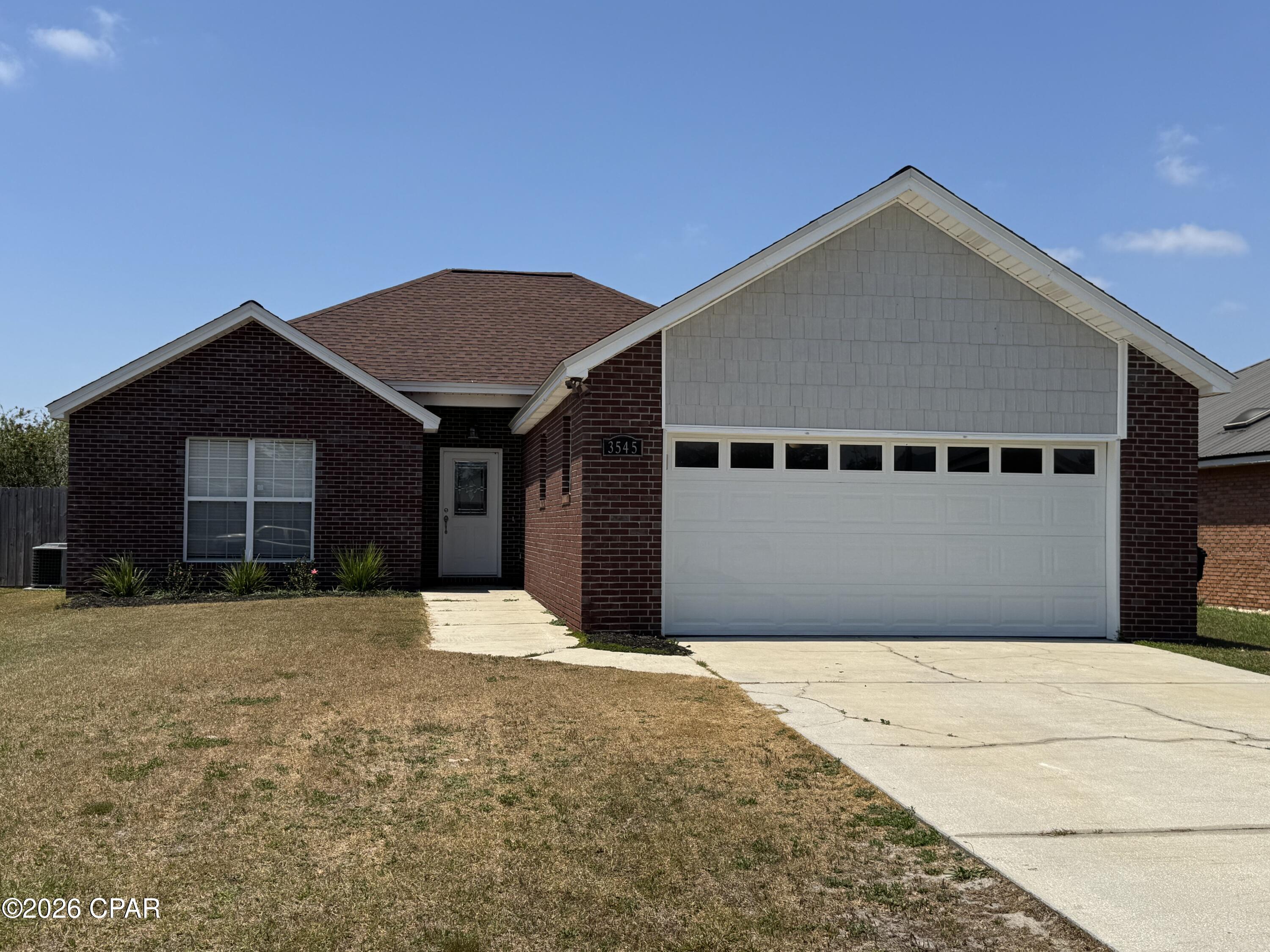 Now available to rent in the centrally located Brentwood Estates subdivision. This 3 bed 2 bath home features LVP flooring throughout and an electric fireplace in the living area. The main bedroom has a large walk in closet, double vanity sinks and a jacuzzi tub as well as a shower stall. There is extra storage in the garage and the yard is privacy fenced so pets welcome (with fee). This home has been well cared for and is near the end of the cul de sac street. Close to dining and shopping in Panama City and Callaway. Less than 10 miles from Tyndall Air Base. Ask about discounted security deposit for Active Duty Military.