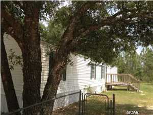 This 3 bedroom 2 bath mobile home is located in the quiet Green Acres Mobile Home Community, on a large lot of property. This home features an split bedroom floor plan to give extra privacy, and an eat-in-kitchen equipped with refrigerator, stove/oven. Central heat and air. Water, sewage, washer & dryer included. Come and experience quiet country living. Pets are negotiable with a non-refundable $150 per animal fee. *All measurements are approximate.