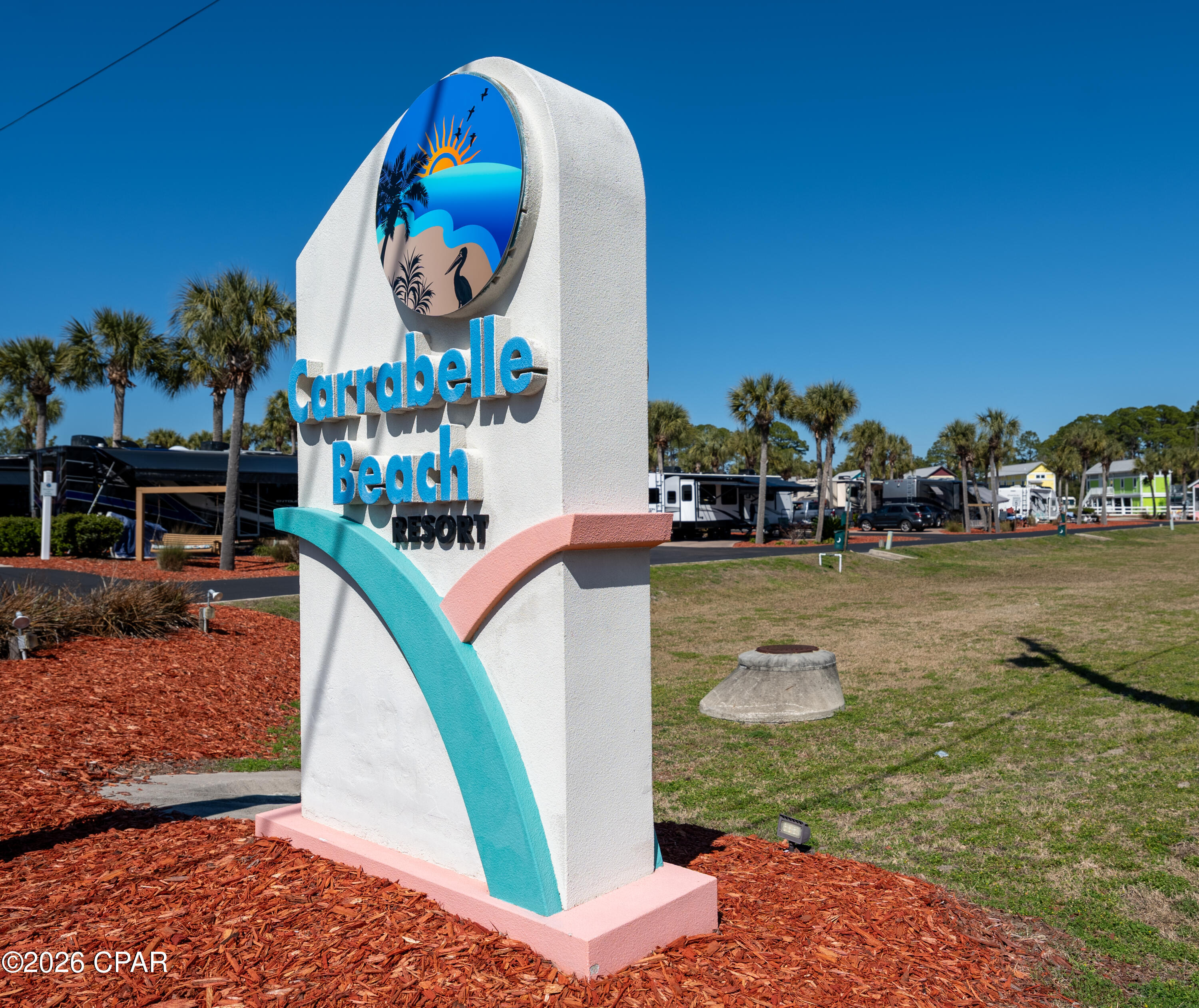 Welcome to Carabelle Beach RV resort.  This 45ft pull through premium lot is ready for the summer.  Located next to a dog friendly beach. The resort offers amenities such as club house, heated pool,  dog park, and store.  These sites can be rented when not in use to generate extra income.  Sites are level and have 30 and 50 amp hook ups, wifi, and cable.