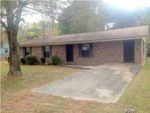 This recently updated home is on a large half acre lot features a split bedroom plan with one of the rooms offering a completely independent entrance. The master bedroom is handicap accessible to include larger doors and bathroom accommodations. The other bedrooms are good size offering walk in closet and ceiling fans. Recent updates feature new Stainless Steel Whirlpool Range & Range Hood, new Exterior door, new closet doors, new living room and bedroom ceiling fans, new carpet and fresh coat of paint throughout the entire home. Very comfortable brick home in a country setting but very near by one of the most quaint small towns in the area. Famous for the Tupelo honey. Square Footage, and room sizes approx, if important please verify.