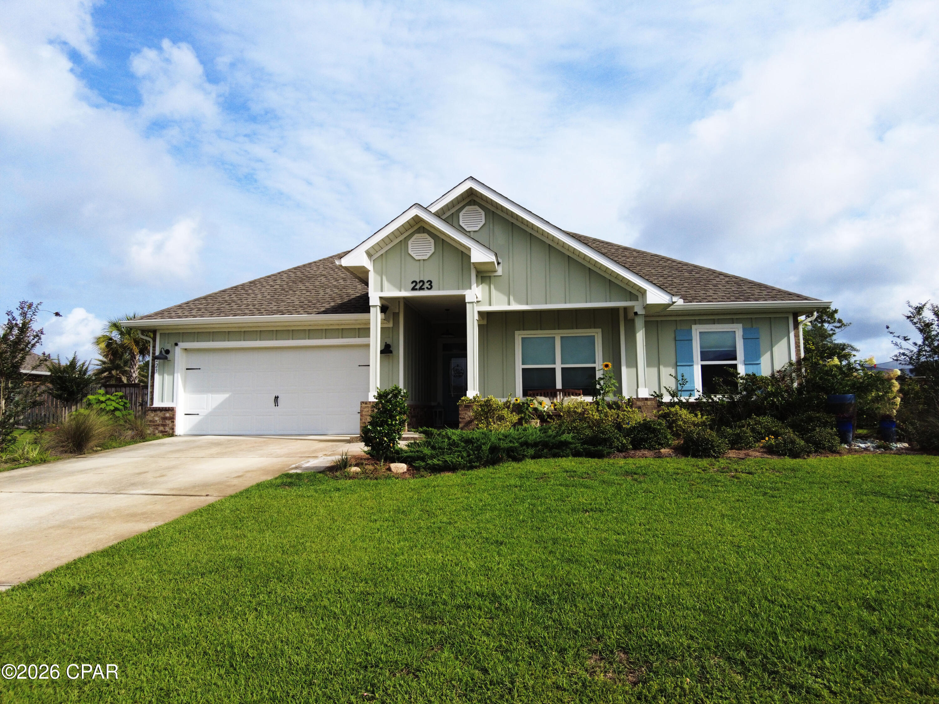 Waterfront Paradise on Newman Bayou with Gulf Access!

Welcome to your dream coastal retreat at 223 Confidence Way in the heart of Southport. This stunning 3-bedroom, 2-bathroom residence perfectly balances elegant interior design with an unmatched outdoor oasis.

Step inside to discover a bright, open floor plan highlighted by premium flooring, a large chef's kitchen featuring an expansive granite island with breakfast bar seating, stainless steel appliances, and gorgeous white cabinetry. The main living spaces and the luxurious primary suite are elevated by striking, double-tray scalloped ceilings that add architectural drama and depth. The master suite serves as a private sanctuary, complete with an expansive master bath boasting a double vanity with granite countertops, a deep soaking tub, and a separate walk-in shower.

The true showstopper of this property is the backyard. Walk out onto an expansive, custom-paved back patio covered by a dramatic wooden pergola, fully equipped with a high-end built-in outdoor kitchen and stone-wrapped grill station--ideal for hosting family cookouts or evening cocktail hours. Beyond the patio, a private wooden dock extends into the serene waters of Newman Bayou. Bring your boat, jet skis, or kayaks and enjoy direct, seamless access to the open waters of the Gulf of Mexico.

This property is exceptionally maintained and proudly offered as an Agent/Owner listing. Don't miss your chance to live the ultimate Florida waterfront lifestyle!