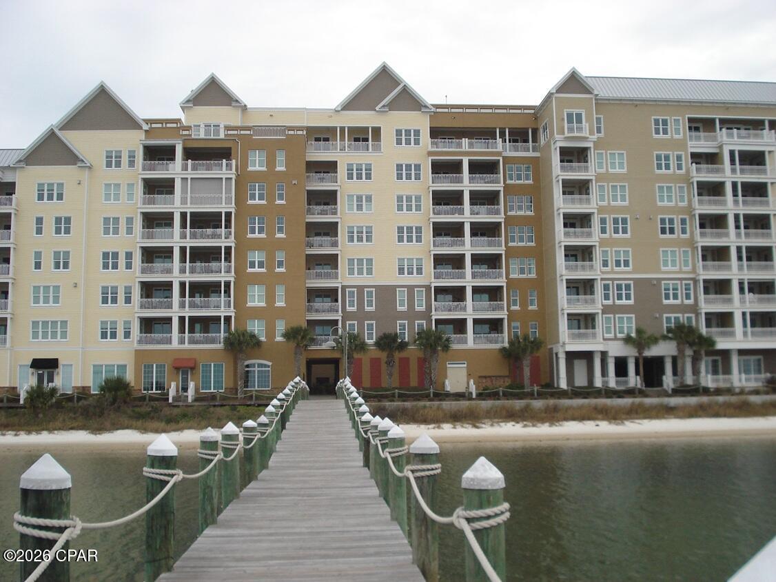 Spectacular Views from this 3 Bed/3Bath Bayfront unit in Harbour Village! A one of a kind gated community in the heart of Historic St. Andrews. Condo boasts 11ft ceilings and breathtaking views of St. Andrews Bay, Shell Island, and the Intracoastal Waterway from the master suite, living area, dining room, and kitchen. The open layout features double front door, a gourmet kitchen with sleek stainless steel appliances, granite countertops, a spacious breakfast bar, and ample cabinetry, luxury vinyl plank (LVP) flooring, sliding glass doors from Living room & Master to the spacious Balcony. The Master Bathroom features a double vanity, a soaking garden tub, a tiled walk-in shower, and a generous walk-in closet. The second bedroom has a private bath. Elegant crown molding adorns the entire unit and modern lighting fixtures enhance the entire unit. Condo owner has 2 boat slips (1 with 16,000lb lift) and 2 climate controlled storage units, included in the sale.
Harbour Village offers an array of premium amenities, including a heated waterfront pool with bay views, a state-of-the-art fitness center, a grand clubhouse, a private community park (dogs allowed) with a garden, a covered parking garage, an outdoor fireplace with a cozy seating area, a grilling gazebo with access to Oaks by the Bay Park. Just steps away, Historic St. Andrews beckons with its active marina (currently being upgraded), restaurants, scenic waterfront parks, and unique boutique shops.  Seize this rare opportunity to own a slice of coastal elegance and modern sophistication in one of Bay County's most coveted communities. Schedule your private tour today! All info taken from appraiser and sizes approx., Buyer to verify all info.