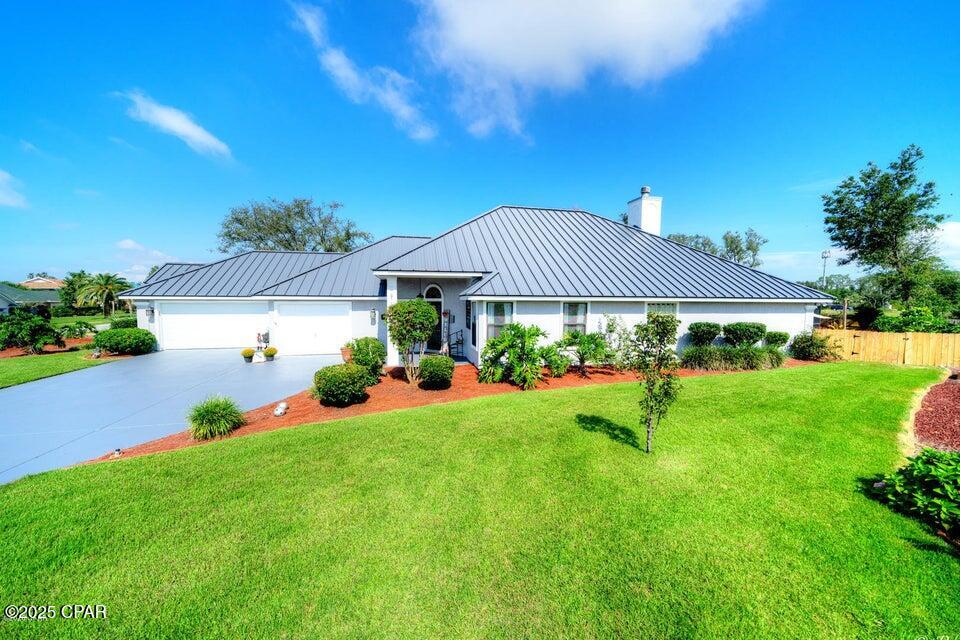 Unique opportunity to purchase an extraordinary 4 BR 2 BA property. Home has high wind metal roof which was installed in 2020 in this guard gated community of Bay Point subdivision with all the bells and whistles. 
Master bath with large walk in closet with shelving and drawers , 2 sink vanity, jacuzzi jetted tub with glass block wall for extra light. large walk in shower with rain water and hand  shower fixtures and grab bar. Porcelain tile throughout. Ceiling fans throughout. Professionally landscaped one third acre cul de sac home with professionally epoxied floor 2 car garage and golf cart garage with 6 foot stainless steel work bench and storage cabinet. Very private Heated saltwater pool with cool deck and large tiled lanai with palm ceiling fans and Wall mounted TV. New 6 foot lighted fence. Well irrigation system with new pump. Energy star efficient  smart water heater and new Samsung smart kitchen appliances with new quartz countertops. New energy star 2 stage Trane air conditioning and heat pump system. Wood burning  fireplace with custom stone design and 85 inch Samsung crystal 7 series UHD 4 K TV professionally installed will convey with the sale 
. Ring video security system at front door, back yard and entry gate. Office/ bedroom with closet Murphey queen bed. Garden pond with waterfall and lighting in backyard. A true resort within a resort with a Nicklaus golf course, remodeled marina, restaurants and bars a short walk or golf cart ride away. Look at the ''Supplement'' button at the top of this page for a list of upgrades.
Fire pit and fire tower do not convey. Trane 18 seer air conditioner, energy star HVACV system with matching heat pump and air handler. 2023

New pool pump 2024

New well pump 2025

Energy star smart electric water heater 2022

New digital led pool light 2025

Chimney sweep and inspection 2025

Garage floor professional epoxy installed 2022

New kitchen quartz countertops 2025

New Samsung dishwasher 2024

New Samsung smart microwave 2024

New Samsung smart range and ceramic cooktop with air fryer. 2024

New garbage disposal. 2024

Two Florida fancy palms installed 2024

Professional landscaping. 2022 through 2025

New professionally installed kitchen subway tile and fireplace and living room niche stone work.. 2025

Hallway, living room and kitchen walls and ceiling professionally painted. 2025

New blinds installed all rooms. 2025
Palisades Zozia sod  in front yard and entire backyard 
2022 and 2025
Included with the sale of the house are the professionally installed Samsung 85 inch series 7 QLED 4K smart TV and
All appliances, infrared grill, stainless steel work bench and cabinet in garage. Zodiac barracuda G3 pool sweep and all pool equipment.