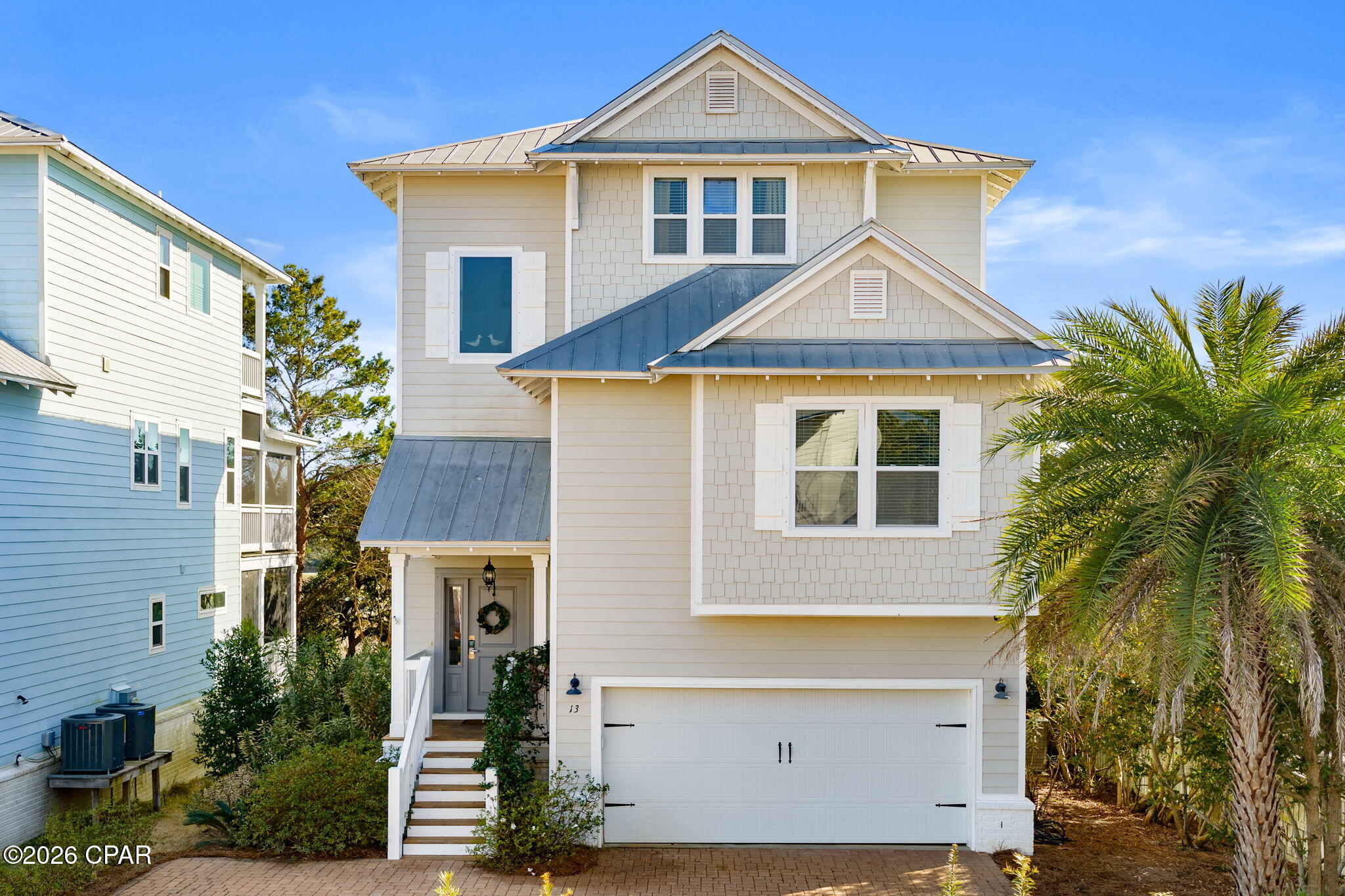 Tucked away in the sought-after Inlet Heights community of Inlet Beach, this beautifully appointed 3-story, 4 bedroom coastal retreat offers the perfect blend of luxury, location, and lifestyle. Just a short distance from the sugar-white sands of the Gulf, this home is ideally positioned for enjoying everything along Scenic Highway 30A.

Designed for both relaxation and entertaining, the home features multiple levels of decks and a private fire pit area, perfect for gathering with friends and family after a day at the beach. From the third-story balcony, enjoy stunning water views of the Gulf, creating the ideal setting for morning coffee or sunset evenings.

Inside, the thoughtfully designed layout offers hardwood floors throughout the main living areas, a spacious great room, and an open dining area that flows seamlessly for entertaining.

The first level includes two guest bedrooms and a laundry room, offering privacy and convenience for guests. The second floor features an additional bedroom and full bath, while the third floor is dedicated to an oversized primary suite complete with an office nook, his-and-her vanities, a large soaking tub, and a beautifully tiled walk-in shower.

Additional highlights include a 2-car garage, paver roads and driveways, and the home is being sold fully furnished, making it truly move-in or rental ready.

Residents of Inlet Heights enjoy exceptional amenities including a community pool, community room, and a dock overlooking Lake Powell. The location also allows for an easy walk or bike ride to 30Avenue, Rosemary Beach, and nearby public beach access, placing dining, shopping, and the beach all within reach.