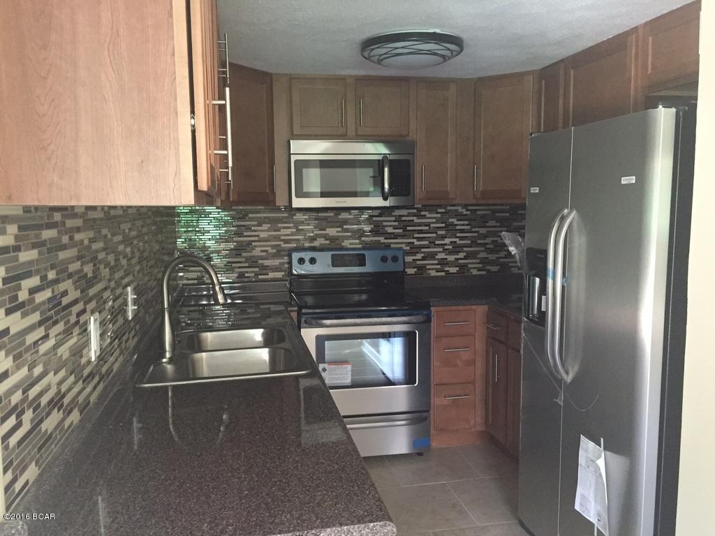 Completely remodeled 3BR/2BA home inside and out.  The exterior has a new metal roof and paint.  The interior has a new kitchen with stainless Steele appliances with tile backsplash. New custom tile shower in both baths along with new paint throughout. Beautiful tile work! New HVAC. Affordable living @ $85,000 turn key ready!