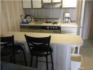 LOOKING FOR AN INVESTMENT ON THE BEACH AT A LOW, LOW PRICE. THIS IS IT! THIS UNIT CAN BE BOUGHT AND IS CONNECTED WITH TWO OTHER UNITS ALLOWING 3 FAMILIES TO STAY DOOR TO DOOR OR OPEN UP ALL 3 UNITS AT ONCE. ALL UNITS FACE THE GULF. THE EXTERIOR OF THE BUILDING IS GOING TO BE RENOVATED SHORTLY, WHICH WOULD ADD EQUITY TO YOUR INVESTMENT. YOU MAY BUY JUST ONE UNIT OR BUY ALL THREE.