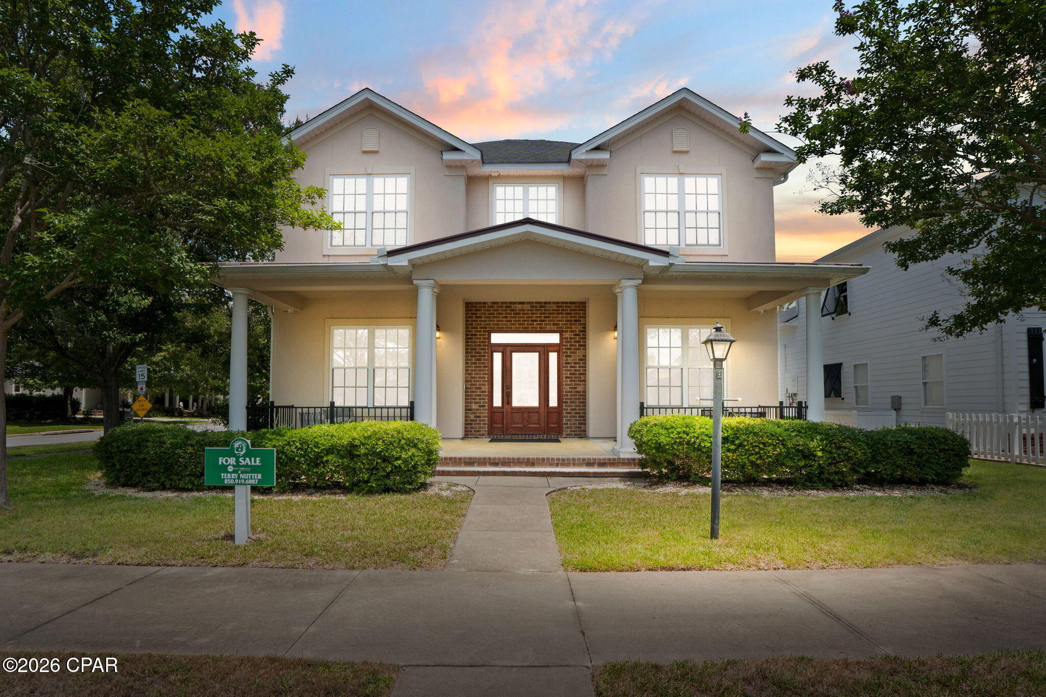 Pre-appraised and strategically priced for immediate buyer equity!  This beautifully updated home offers outstanding value in the heart of Panama City Beach.  Welcome to 319 Coconut Grove Court -- a beautifully updated 4-bedroom, 4-bath home situated on a desirable corner lot in the coveted Tapestry Park community. This is an incredible opportunity to own a spacious coastal home just two blocks from the world's most beautiful beaches.  Designed with both comfort and functionality in mind, the home features a modernized kitchen with newer appliances, custom-crafted cabinetry, granite countertops, and a charming breakfast nook. A separate formal dining room provides the perfect space for entertaining family and friends. Crown molding throughout adds timeless character and elegance.
The flexible floor plan includes a first-floor bedroom or flex space with a full bathroom -- ideal for guests, multi-generational living, or a home office. Upstairs, the expansive primary suite offers a tray ceiling, two walk-in closets, and a recently remodeled spa-inspired bathroom featuring a walk-in shower, double vanity, and private toilet room. Two additional upstairs bedrooms share a thoughtfully designed Jack-and-Jill style bathroom with pocket doors separating dual vanity areas from the tub/shower and toilet room for added privacy and convenience. An upstairs sitting nook creates additional flexible living space perfect for reading, work, or relaxation.  Additional upgrades and features include two AC units, recently added stair lift, leaf gutter guards, outdoor security cameras, sprinkler system and a private backyard/back porch area enclosed by a concrete privacy wall.
Residents of Tapestry Park enjoy exceptional amenities including two swimming pools, clubhouse, basketball, tennis and pickleball courts, playground, sidewalks, and beautifully maintained common areas.  Perfectly located in the heart of PCB, this home offers convenient access to local favorites including Pier Park, Pirates Voyage Dinner & Show, Frank Brown Park, along with countless dining, shopping, and entertainment options nearby.  This is coastal living, space, and value all in one -- schedule your private showing today!