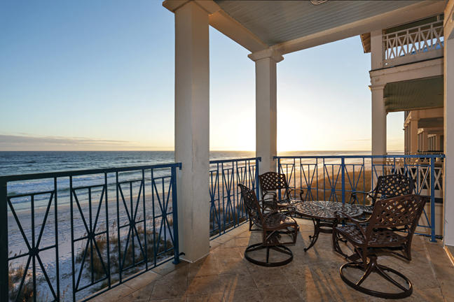 Located directly on the Gulf in the sought after Delos community, here is a 4 bedroom, plus large bunk room, 4 bath townhome that boasts three levels, all accessible by private elevator, of upscale and refined living. Beautifully detailed, this property offers comfort and warmth with gorgeous travertine and hardwood flooring, full length windows, 10 foot ceilings with crown molding and decorative features throughout. The first story boasts a large bunk room with three custom, built in queen over queen bunks, additional guestroom and full bath as well as deck, splash pool and private access to beach. The main level features a gulf facing living room and gourmet kitchen, complete with stainless steel appliances, granite counters and breakfast bar which leads to oversized balcony, ideal for alfresco dining and watching the sunset. Two additional guest rooms are on the north side of the second story with decks facing Scenic Gulf Drive. The spacious master suite occupies most of the third level with its own private balcony. Tranquil elegance abounds indoors and out in this one of a kind home.