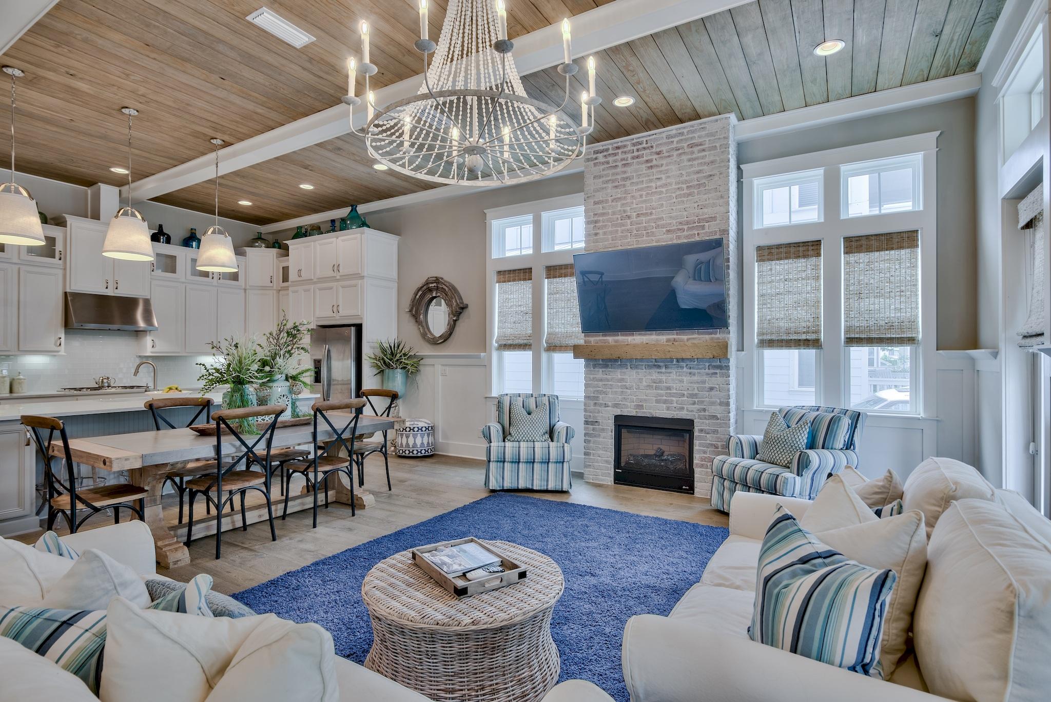 ''Coastal Chic'' is the jewel of Highland Parks, tucked deep in the neighborhood and bordering the state forest, this custom-built Sienna Plan is offered professionally decorated, fully furnished and flawless. Truly graceful proportions abound, with exquisite decorative touches, top-of-the-line upgrades and finishes. 12' ceilings cap the impressive great-room/kitchen combo, perfectly suited for entertaining, with hardwood floors, quartz countertops, crown molding, and near ceiling height cabinets. Rounding out the first floor is one of two spacious master suites, a powder room, two storage closets, and two large porches. Special touches like the floor-to-ceiling brick fireplace, board & batten trim and the driftwood stained shiplap ceiling complete the main level. Golf cart now included! Continuing to the second floor, capped with 10' ceilings, you are greeted by a spacious landing currently configured as a media space. From the landing you will find a second master suite, two guest bedrooms each with a full bath and two more porches!

No detail was overlooked and no upgrades were left behind, "Coastal Chic" truly is the jewel of Highland Parks.