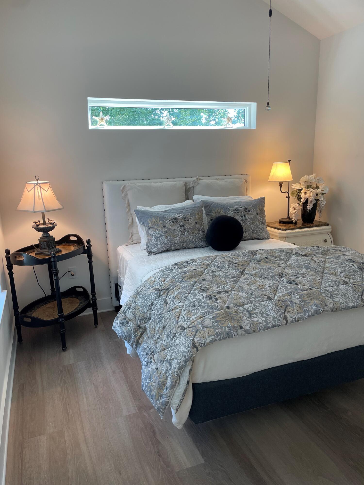 New and beautifully decorated 1BR/1B studio coach house has all the amenities. Located in a quiet neighborhood off West 30A, within walking distance to the beach, and in close proximity to the best restaurants and shopping, including Grand Boulevard, Silver Sands Premium Outlets, Destin Commons, and of course all that 30A has to offer.  Sacred Heart Hospital is just 3 ½ miles away. This above-garage coach house was designed to include all of your living needs.   Includes a queen bed, furnished living area, fully equipped kitchen with bar stools, stackable washer and dryer, walk-in closet, a dedicated parking spot, a private entrance, and a serene patio terrace. Rent includes water, electric, WIFI, Satellite Direct TV, and residential trash pickup. One person only. No pets or smoking.