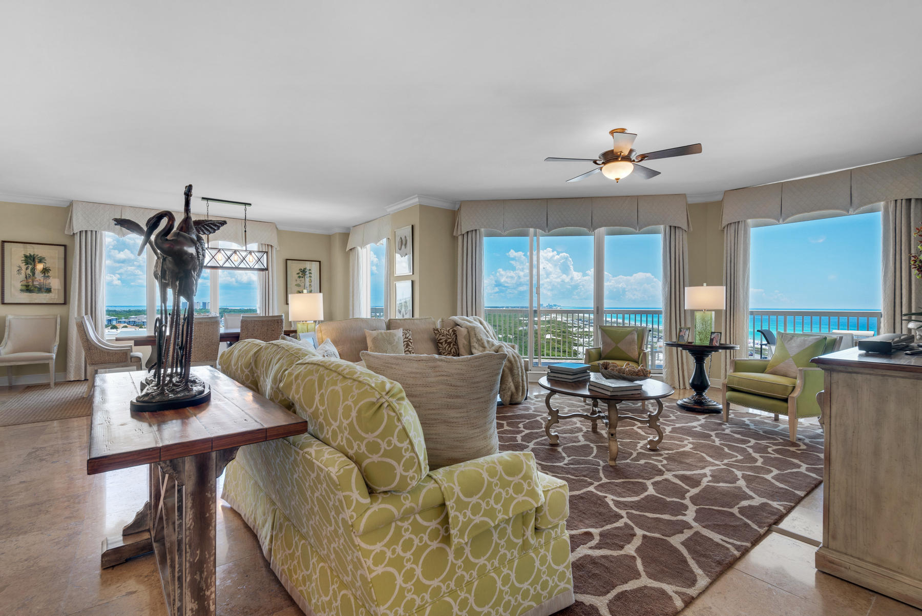 Impressive 14th floor corner unit in St. Barth at Silver Shells Beach Resort & Spa. Expertly designed to showcase extraordinary views of the Gulf of Mexico and Henderson Beach Park from three sides. This residence affords the ultimate coastal lifestyle with luxury amenities, modern conveniences, and enhanced interior finishes. Notable features include travertine tile flooring, granite countertops, covered terraces, and a luxury master bath with spa tub. This condominium includes an assigned parking spot in the underground garage and private storage unit. St. Barth at Silver Shells is rental restricted (no rentals under one-month), and provides deeded beach access; a private, beachfront pool and spa; gym; tennis courts; gazebo and grill area; seasonal beach chair service; and more. The 31-acre Silver Shells resort offers a lagoon pool, full-service spa, and onsite fine dining.