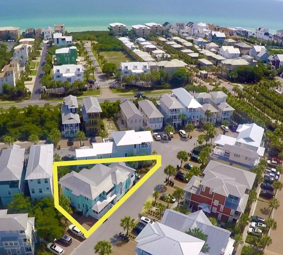 A tropical beauty, this Seacrest Beach house features 5 bedrooms, 5.5 bathrooms in one of 30A's most desired communities. Producing almost $90K in rental income in 2019, the house is perfect for vacation rentals, welcoming 15 guests at a time. Built in 2005 and fully renovated in 2014, enjoy a gourmet kitchen, Australian Cypress hardwood floors, and a farmhouse style dining table that invites guests to the heart of the action in the kitchen and open concept living room. The master suite is located on the first floor with a double vanity, extra deep soaker tub and a separate dual-head shower. Two guest bedrooms and a bunk room are located on the second floor, all with en-suite bathrooms. The main house comes furnished. The carriage house is a great addition, featuring a full kitchen, spiral staircase and loft bedroom. The carriage house does not come furnished.