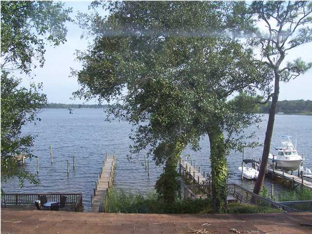 ***Waterfront*** panoramic view of bayou and pass to bay. Enclosed porch, tiled kitchen, porch, downstairs bath & foyer. Built-in book shelves & entertainment center. Watch magnificent sunsets and dolphins play. Sail away to Destin in minutes. Owner will consider small pet with $255 non-refundable pet fee. Sorry NO CATS. NO SMOKING!
****Reminder: Everyone 18 or over planning to live in the house must fill out an application.