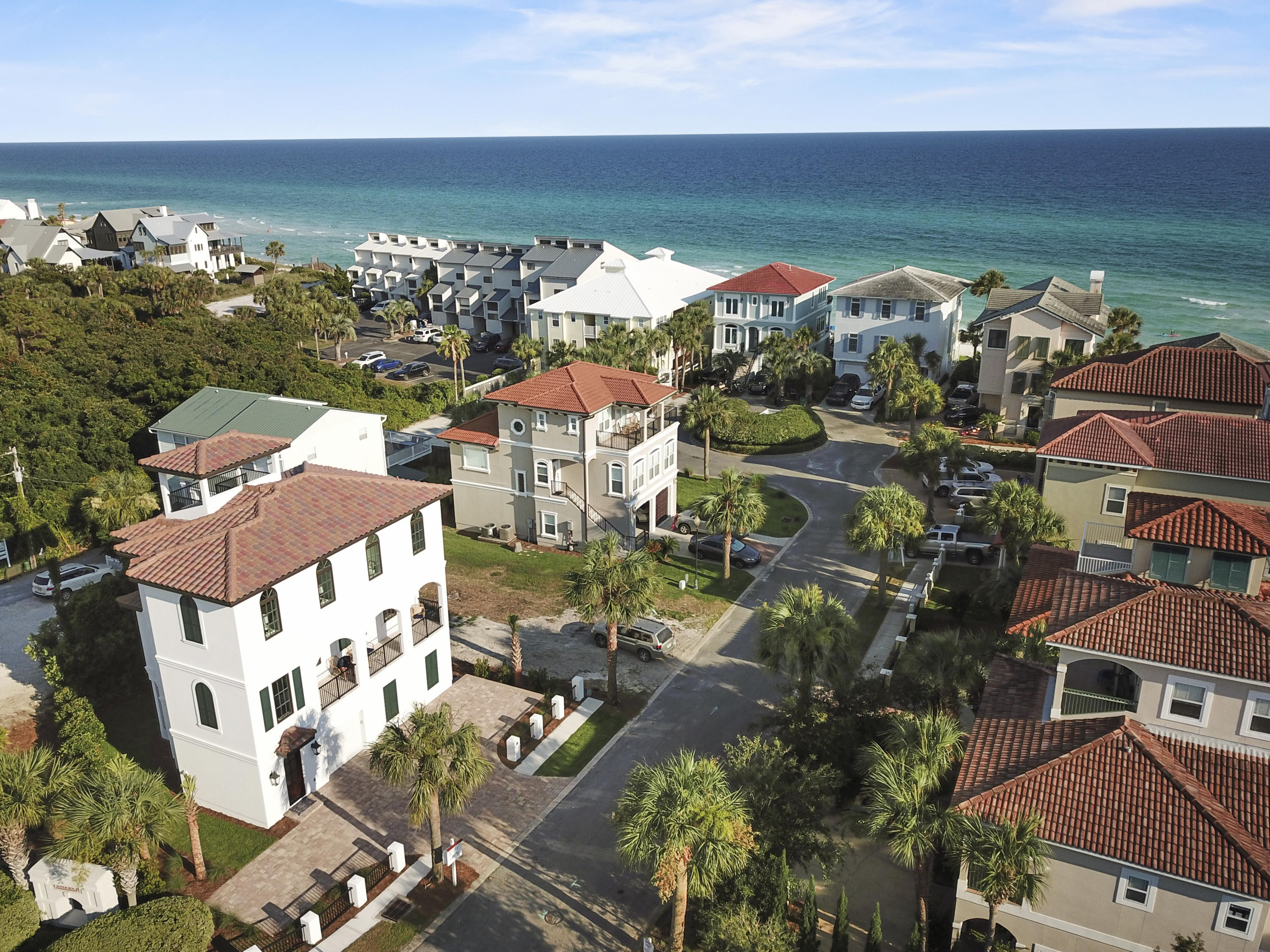 Brand new gorgeous Spanish Coastal style beach house with gulf views offered fully furnished and turn key ready with rental projections at $129,000. This 4 bedroom 4.5 bathroom, all en suites, located south of 30a, close to all the restaurants and shopping in Blue Mountain Beach. Just a few steps to private gated deeded neighborhood beach access, Gulf views, elevator, great neighborhood pool, designer lighting, 2 laundry rooms, mud room with built in bench and hooks, kitchenette area with beverage center, microwave and TV room off bunk room on first floor. Hardwood and stone floors, Viking cooking appliances, 4 exterior porches, professional interior design by Eiland & Rice Interiors, custom window treatments, bleached pecky cypress and shiplap walls throughout the home. This home can sleep up to 18 comfortably. Attached garage with spacious storage closet perfect for golf cart or smaller car. Lush beautiful landscaping and irrigation. Wired for surround sound and alarm and more!