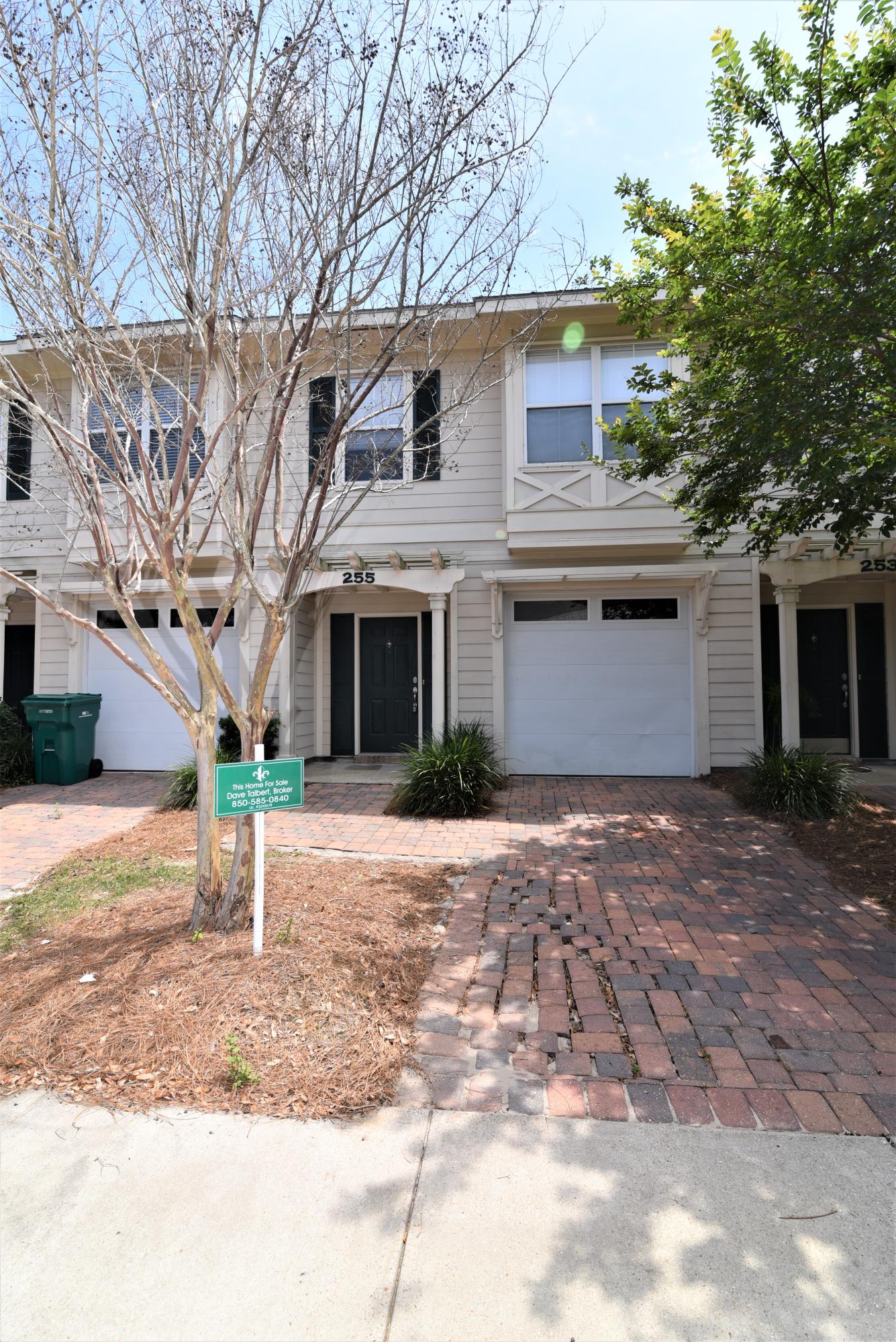MOVE IN READY! Very nice upscale 3 bedroom, 2 1/2 bath, 1 car garage townhome in central Destin. Close to shopping, schools, restaurants, beaches, parks, etc.. New carpet and paint. First floor has nine foot ceilings and includes living, dining, kitchen, half bath, and garage. All three bedrooms, two baths, and laundry are upstairs. Master bedroom has master bath with garden tub and large walk-in closet. MANY FEATURES INCLUDING: Granite countertops in kitchen, stainless steel appliances, ceiling fans, crown molding, and 2'' blinds. Has private covered rear patio off living room. Quality construction with Hardi-Board siding, metal roofs, and brick paver driveways & sidewalks. Some exterior maintenance is performed by HOA.