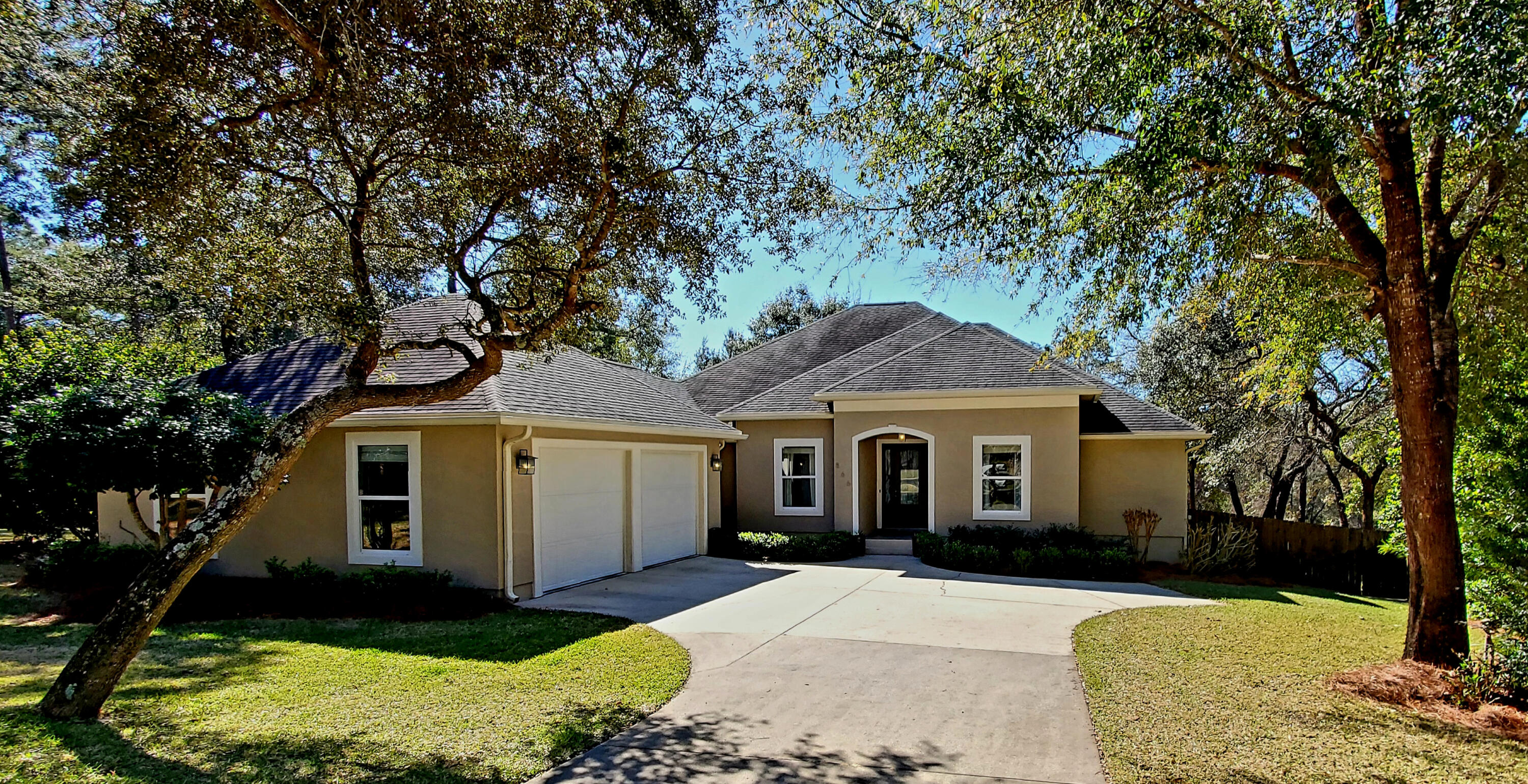 You will truly enjoy this beautiful custom built home with thoughtful lot setting among common area buffers on one side and back overlooking a nature preserve. This is a smart one level home with an open, flowing floorplan and private hallways leading to bedrooms. Low maintenance porcelain tile and wood plank flooring throughout. Upon entering this home, you are lead through the foyer and into the living room which flows into the spacious kitchen and café area. This is all well designed with windows letting in the southernly lighting. The screened porch and open patio area off of the living area are ideal for enjoying a morning coffee, relaxing or grilling. A formal dining room off to the side has french pocket doors and would also make an excellent study, craft room or even 5th bedroom. The kitchen is perfect for entertaining and offers expansive granite countertops, sleek european cabinetry, stainless-steel appliances, large island with cooktop and stainless-steel hood centerpiece. This is a great place to converse while preparing a gourmet meal. Don't forget the extra cabinet storage throughout the kitchen island base as well. The master suite overlooks the nature preserve as well with trayed ceiling, large walk-in closet. The master bath offers separate double vanities, tub and separate shower. The 2nd and 3rd guest suites have a jack and jill bath with individual vanities and commodes. The 4th guest suite is on the far side of the home with the 3rd full bath across the hall. This hallway has a pocket door that can separate this area into an additional living quarters. A convenient mudroom is in the hallway leading to the garage as well. There is also a fenced in area on the western side yard.  A lot of thought and planning went into this beautiful home, lot placement and floorplan. All within the sought after community of Swift Creek offering a beautiful community pool, tennis courts, basketball court, playgrounds and parks.