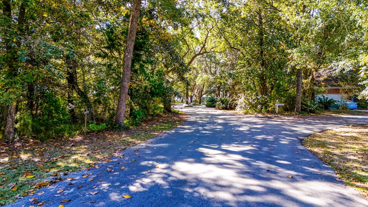 Don't miss out on your opportunity to own one of the last remaining lots in the beautiful Indian Bay subdivision.  Measuring over half an acre, this lot will give you plenty of room to build your dream home.  Mature trees and plentiful greenery will help you achieve the privacy you have been looking for.  Indian Bay offers its residents a gorgeous little stroll along a path to the Choctawhatchee Bay where you will find a dock/pier overlooking the water.  It's the perfect spot to catch a sunrise, watch the sunset, observe the local wildlife, or just kick your feet up and relax.  
Contact me today and let's schedule a showing!
Buyer to verify any and all information deemed important to them.