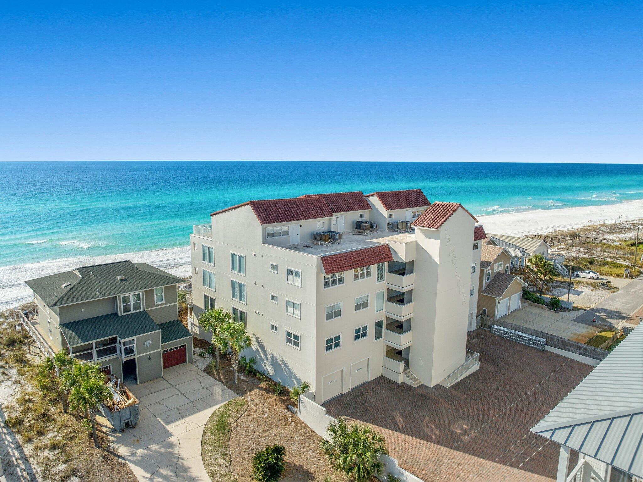 Quality craftsmanship in this beautifully updated gulf front 2 story penthouse condo in the highly desired Sandspur Condominium Complex. Enjoy your own private beach with no crowds! This unit is sure to please with a fabulous kitchen and wet bar for entertaining. Three bedrooms on the main level one currently being used as an office space. Master bedroom is on the second level with ample privacy and a huge patio perfect for coffee in the morning or cocktails in the evening. This unit is truly a gem, a quiet private beach, fully updated with top of the line finishes a garage space, penthouse gulf front condo. Nothing else like it on the market, schedule your showing today as this unit is sure not to last.
