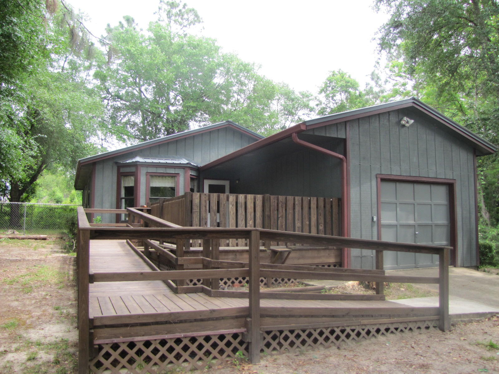 This is a 3/2 features a large open kitchen, inside laundry room, single car garage, covered back deck, and fenced in yard. One small pet will be considered on a case by case basis. The home is available April 13.