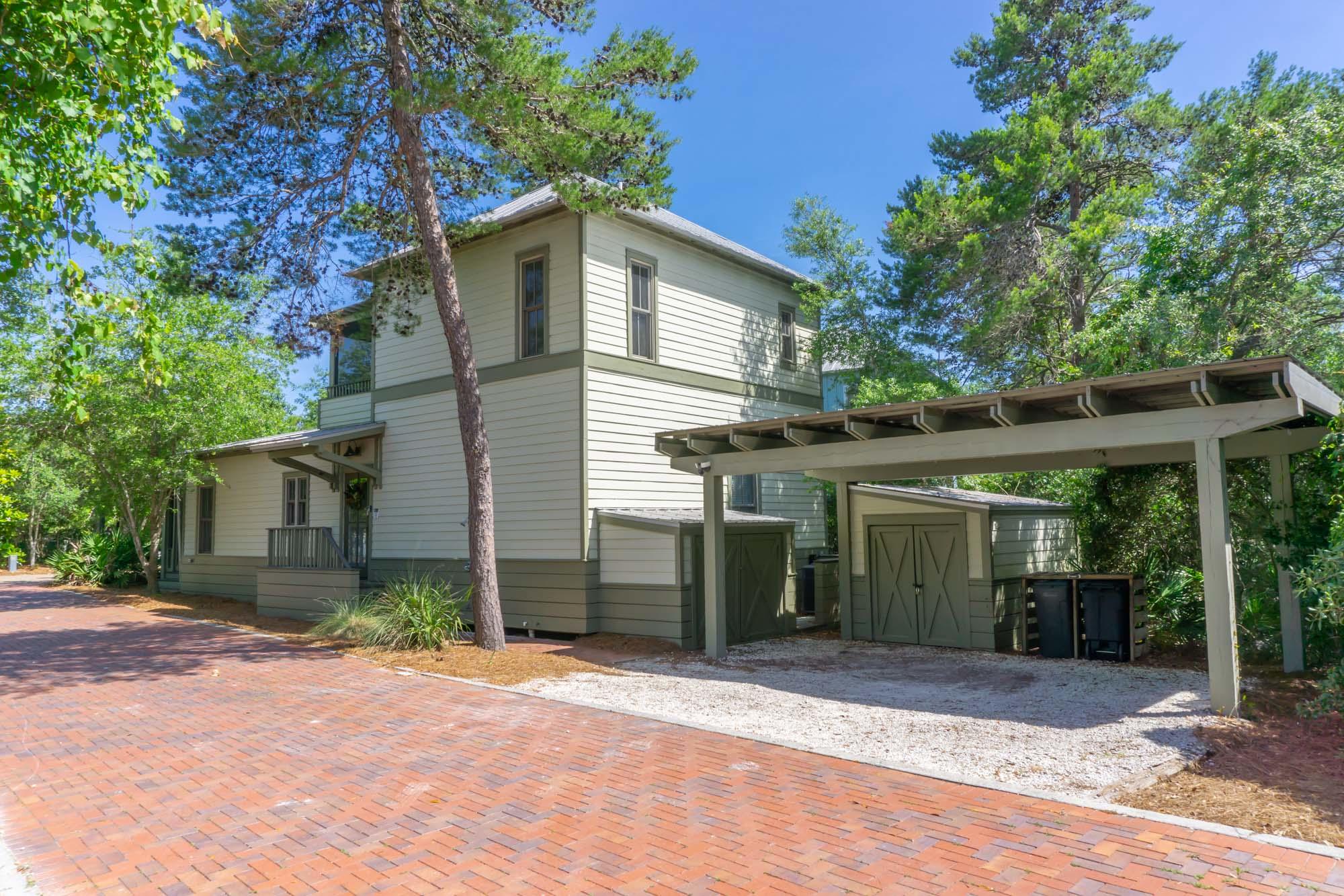 This Beautiful home is located just off 30A in the  sought after quaint & quiet upscale neighborhood  between Rosemary Beach & Seaside. Magnolia Cottages by the Sea has brick paved streets,community pool, & a private beach walkover! The 1st level of this home includes a large & welcoming screened in porch perfect for relaxing or entertaining family & friends. The home boasts beautiful wood floors throughout, granite countertops, designer cabinets & stainless steel appliances. The 1st level is an open concept living/dining/kitchen combination with cedar ceilings & 2 bedrooms & 2 baths. On the 2nd level you'll find a lovely & spacious master suite with french doors leading to its own private covered screened deck. Outside features a 2 car carport & 2 storage sheds for beach toys, bikes etc.