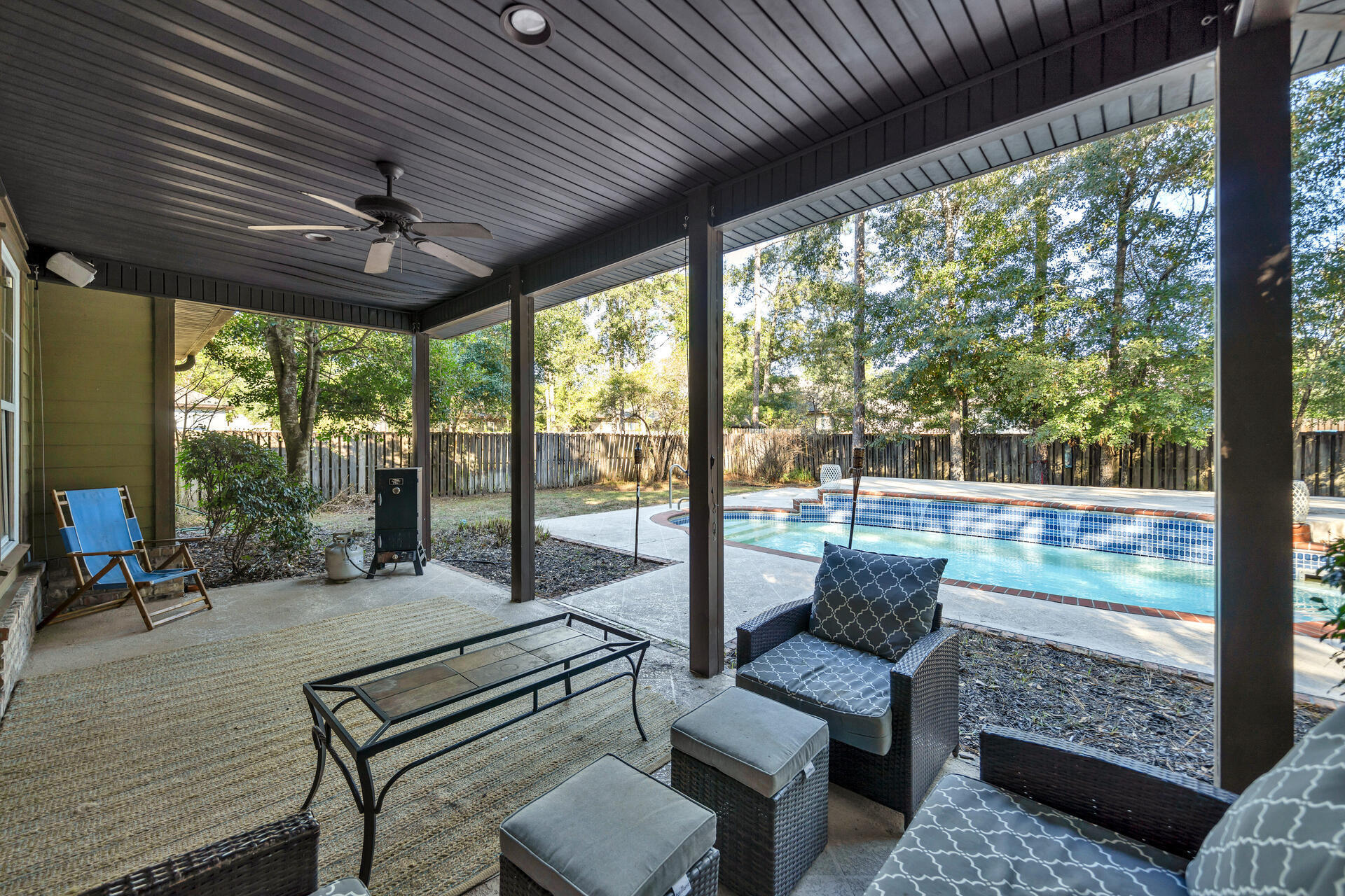 Single story living with a private pool right in the heart of Freeport! This home is located in The Canopies and has much to offer.  In addition to the pool, the property also features a fenced in back yard and two covered porches- front and back.  Open concept living area with split bedroom floor plan. 3 bedrooms and 2 full bathrooms.  Luxury vinyl plank flooring has been installed in the main areas of the home and in the master bedroom.  The kitchen offers granite countertops, stainless steel appliances and breakfast bar.  Generous sized master bath which includes a double vanity with sitting area, jetted tub, walk-in shower, large walk-in closet as well as two additional closets. The home is conveniently located in close proximity to the Publix shopping center, public schools, and much more. Schedule your private showing TODAY!
