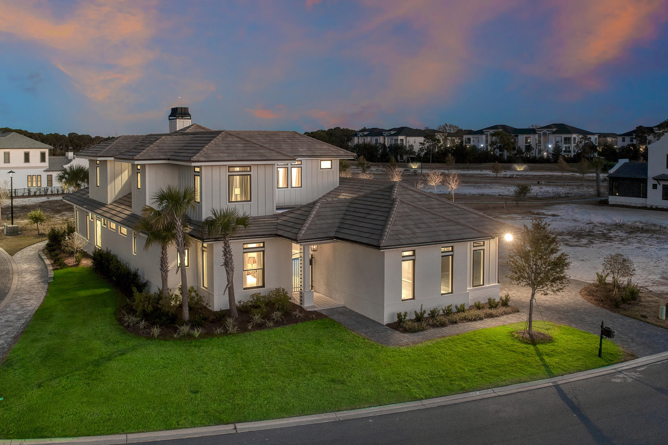 See video link for tour of home.  Welcome to Tradewinds, the newest community in Regatta Bay consisting of 54 homesites with a West Indies/Dutch architectural influence.  This beautiful brand new home offers modern luxury indoor/outdoor living w/over 4200 sq. ft. of heated/cooled space, 4 beds, 4 full baths + 2 half baths and a large study. Exterior features include an inviting front entrance courtyard with pool and spa. Back porch with summer kitchen w/gas grill, sink, beverage cooler & storage. 3 car garage + golf cart garage w/Ninja floor coating.  The home was finished with Designer chosen selections including marble & white oak flooring, quartz & marble countertops, solid wood custom cabinetry & shelving, white oak trim & quartz tiles in the kitchen. Click ''more'' for additional in The 1st floor offers a split floor plan and includes a family room w/gas fireplace, gourmet kitchen & scullery, formal dining right off the kitchen, master suite w/ a showstopping master bath which includes a very large custom marble tile and glass shower, separate his and her vanities, soaking tub and a large extended master closet. Also, on the 1st floor you will find a guest suite w/ private bath, large study w/double doors, powder bath for guests and large laundry room which is accessible 2 ways-the guest hallway and privately accessible from the master closet. The gourmet kitchen and scullery offer Dacor stainless appliances which include a 6-burner gas range w/double oven, pot filler, a wall oven & microwave, refrigerator column, separate freezer, 2 dishwashers, and under counter ice maker. The 2nd floor offers 2 guest suites w/ private baths, spacious family room, lounge area, wet bar and powder bath. 
This beautiful home was built by Legendary Home Builders, utilizing only the finest materials and high end finishes such as: wind and impact resistant windows, wind and impact rated doors, insulated wind and impact rated garage doors, foam spray insulation in roof for superior energy efficiency, insulation in all interior walls for energy efficiency, sound proofing insulation between floors for sound barrier, Mana bloc plumbing systems, gas lanterns, stainless steel door hinges, custom wood shelving in all closets, Kohler plumbing throughout, Schluter waterproofing systems for tile in showers specifically designed to maintain integrity & durability, three a/c units for maximum efficiency, custom solid wood cabinetry throughout with soft close hinges, surround sound, smart home technology customizable for homeowner, led lighting throughout and so much more...