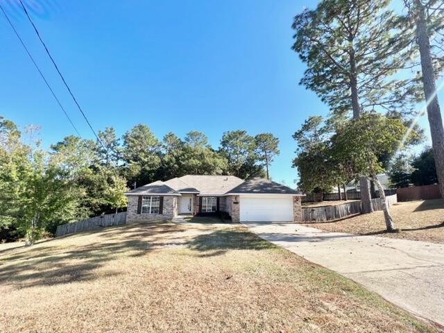 This beautiful all brick home features four bedrooms and two bathrooms which have white cabinets with white granite and modern features! The kitchen has gorgeous white cabinets with black granite and stainless steel appliances! The master has a large bathroom with a large walk-in closet. The living room is large and inviting, perfect for entertaining and features wood looking laminate! Enjoy quiet evenings on your oversized deck. Pets allowed with owner approval, NO CATS. 

**Please see more information for info on Resident Benefits Package**

Tenant to verify all Data
To schedule a showing please call Sound Choice Real Estate at 850.389.8533
 **$50 of monthly rent goes towards a Resident Benefits Package which includes Renters Insurance, Air Filter delivery, Identity protection, Resident Rewards program, Credit Building, Move-In Concierge, 24/7 Maintenance coordination, Home Buying Assistance, and an Online Portal**