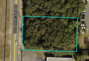 Prime Commercial Opportunity in the Heart of Crestview!
This vacant land parcel offers exceptional potential for development—ideal for medical offices, retail shops, or professional services. Located just minutes from North Okaloosa Medical Center, established doctors' offices, subdivisions, and major shopping centers, this property sits in one of Crestview's most active and accessible areas. It's also within a county enclave surrounded by the city, making annexation into the City of Crestview currently free. Upon annexation, preferred C-1 zoning allows for low-intensity commercial uses and multifamily development up to 25 units per acre. Sewer access is available nearby on Brookmeade Drive (west side); connection would require boring under the road. High visibility and central location  make this a standout opportunity for investors or end-users alike.