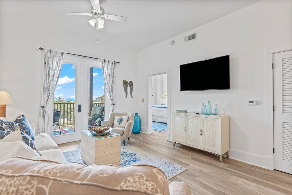 Top-Floor Gulf-View Condo in Redfish Village, Blue Mountain Beach
Discover coastal living at its finest in this beautifully updated 2-bedroom, 2-bathroom condo in the heart of Blue Mountain Beach at Redfish Village. Perched on the top floor, this residence boasts stunning gulf views from the balcony, living room, kitchen, and master bedroom. Recently refreshed this 1,185-square-foot retreat features new flooring, freshly painted walls, a modern kitchen backsplash, and updated appliances including a washer/dryer, dishwasher, and microwave. Sold fully furnished (excluding some art), it includes new beds, furniture, and TVs ready for your personal enjoyment or as a turnkey rental. Enjoy private deeded beach access just a block away, complete with a complimentary shuttle.  Relax by the seasonally heated community pool, fire up the gas grills, or unwind in the owner's lounge with a fitness room and TV theater. The scenic lakefront boardwalk along Big Redfish Lake adds natural charm, all steps from the 30A bike path connecting to Seaside and Grayton Beach State Park.

This gulf-view haven blends modern upgrades with resort-style amenities, schedule your private tour today!