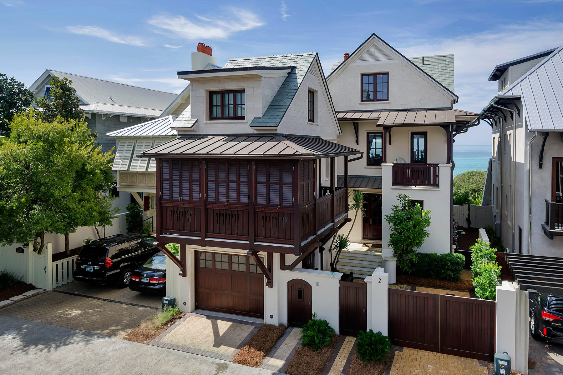 GULF FRONT, GULF FRONT, GULF FRONT! CLASSIC GULF FRONT IN ROSEMARY BEACH: This Main & Carriage House incorporate Quality & Style with a West Indies motif. Level 2 of the Main House hosts the open Living/Dining/Kitchen to take advantage of the Panoramic Views of the Gulf. Level 3 enjoys a spacious Master Suite with Private Living Room and Balcony. Level 1 features 2 Guest Rooms with ensuite Baths and a Bunkroom.
The Carriage House was designed as an Independent Guest Suite with a Living Area, Galley Kitchen, half Bath downstairs and Lofted Bedroom with full bath upstairs.
