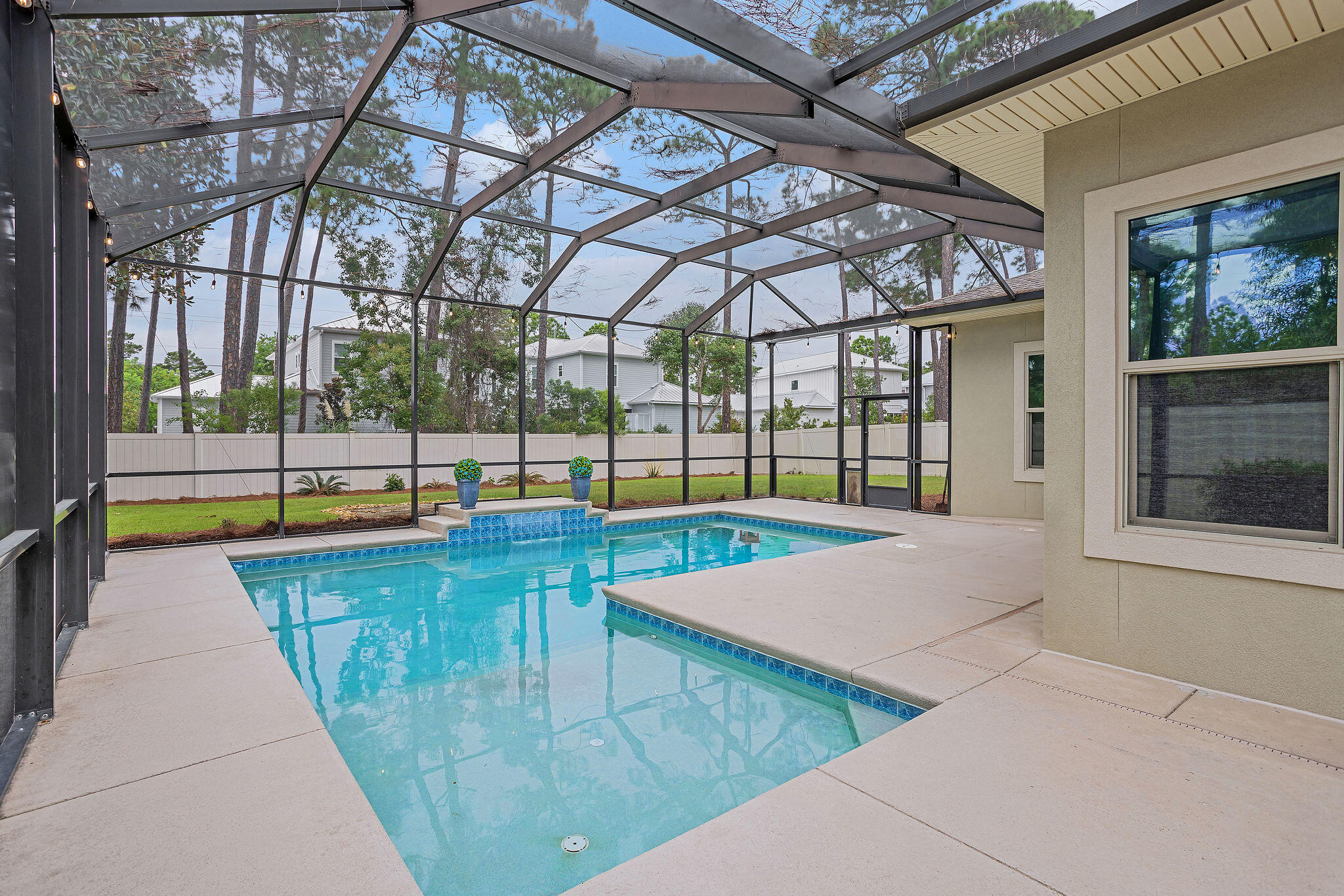 MOTIVATED SELLER! Welcome to 86 Seamist Lane, Santa Rosa Beach—a Coastal Haven of Elegance and Comfort. This 1-owner, 4-bedroom, 4-bathroom residence, with 3,101 sqft of living space, embodies the essence of coastal living. Built in 2012, the home features a gas back-up generator, all new gas kitchen appliances, new sand filter for the heated saltwater pool, and freshly painted main living space. This home exudes coastal charm and features an open floor plan, inviting indoor fireplace, a sizable primary suite, versatile loft space, and a convenient two-car garage making it the perfect full-time residence or rental home. Step outside and you will discover a true island oasis with a screened-in patio and heated pool area, complete with an outdoor natural gas kitchen and bar. Nestled at the end of a quiet cul-de-sac, this beach retreat offers ultimate privacy and tranquility. Additionally, this property is perfectly situated within half a mile of the Gulf of Mexico, two rare Coastal Dune Lakes, and several beach access points, including the newly opened access at Oyster Lake. If you are seeking relaxation or adventure, 86 Seamist Lane has it all. Don't miss your chance to own this exceptional piece of 30A real estate. Contact us today for a private viewing and start living the 30A dream in this coastal escape!