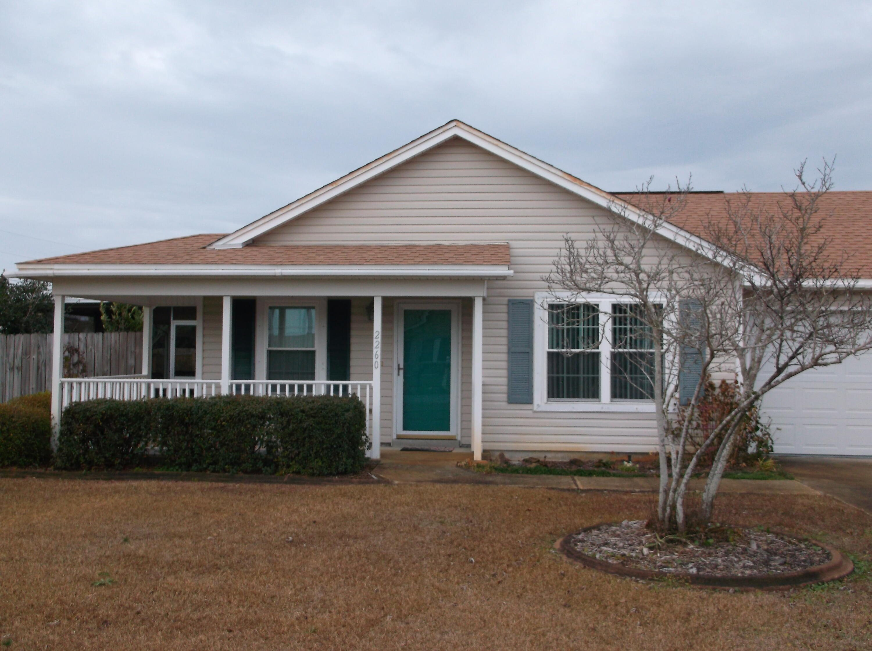 Cute corner location with nice screened in patio.  New roof to go on, with acceptable offer.  Open kitchen to living room.  Tile floors in Kitchen, baths and dining area.