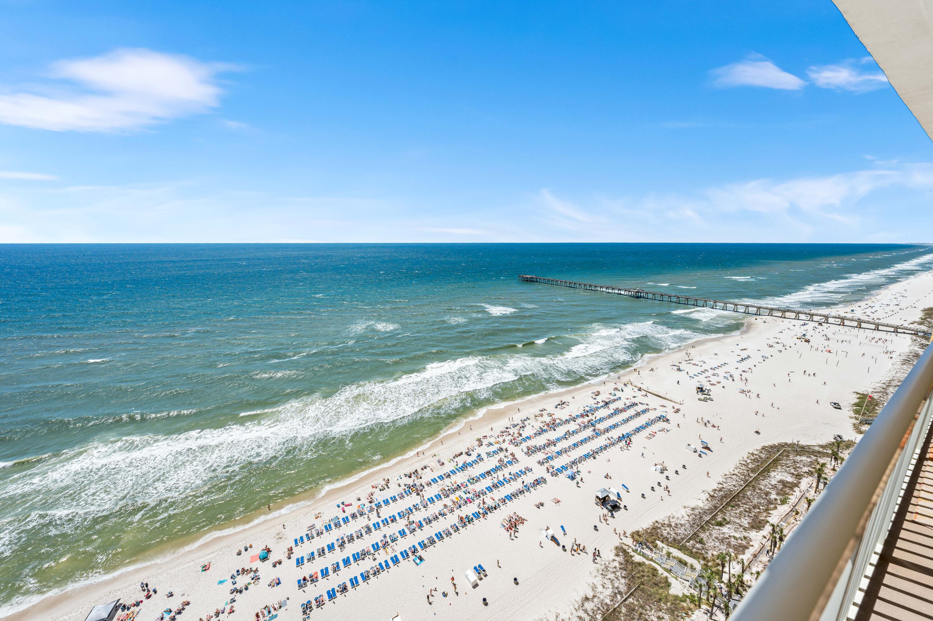 Motivated Seller!
The epitome of vacation rests here in this beautiful PENTHOUSE retreat with panoramic views of the GULF located in the East Tower I. An Expansive balcony for dolphin watching and listening to the waves from the Master bedroom. All updated appliances, fresh paint and a brand new HVAC. This renovated, exceptional unit not only boasts gulf views from the kitchen and wet bar but accommodates 8 with a 3rd bunk room, laundry in unit and easy elevator access. An updated new fitness center in the same building on the 3rd floor, 2 pools with Gulf Views, Tiki Bar & Grill, covered parking & more. Annual Rental Projections up to $75K! This unit has an additional storage closet down the hall. Next to Pier Park with much dining and shopping; this investment is sure to please all!