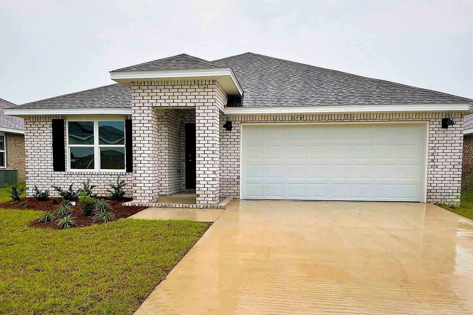 NEW PATRIOT RIDGE community features sidewalks, underground utilities a beautiful community POOL & pavilion for residents enjoyment. The Cali is one of our hottest designs: 4 bedrooms, 2 baths, covered back patio & 2 car garage.  Kitchen offers a large island bar, stainless appliances, GAS range, built in microwave, quiet dishwasher & desirable open design perfect for entertaining & everyday relaxing living. Bedroom 1 & adjoining bath feature a walk in closet, double vanity sinks, large 5' shower & extra lg. storage linen closet. The latest in wood look flooring & plush carpet in the bedrooms. Smart Home Connect Tech System has your video camera doorbell/keyless entry & MORE + fabric hurricane window/door protection  is included. sharp, stylish home conveniently located in So. Crestview.