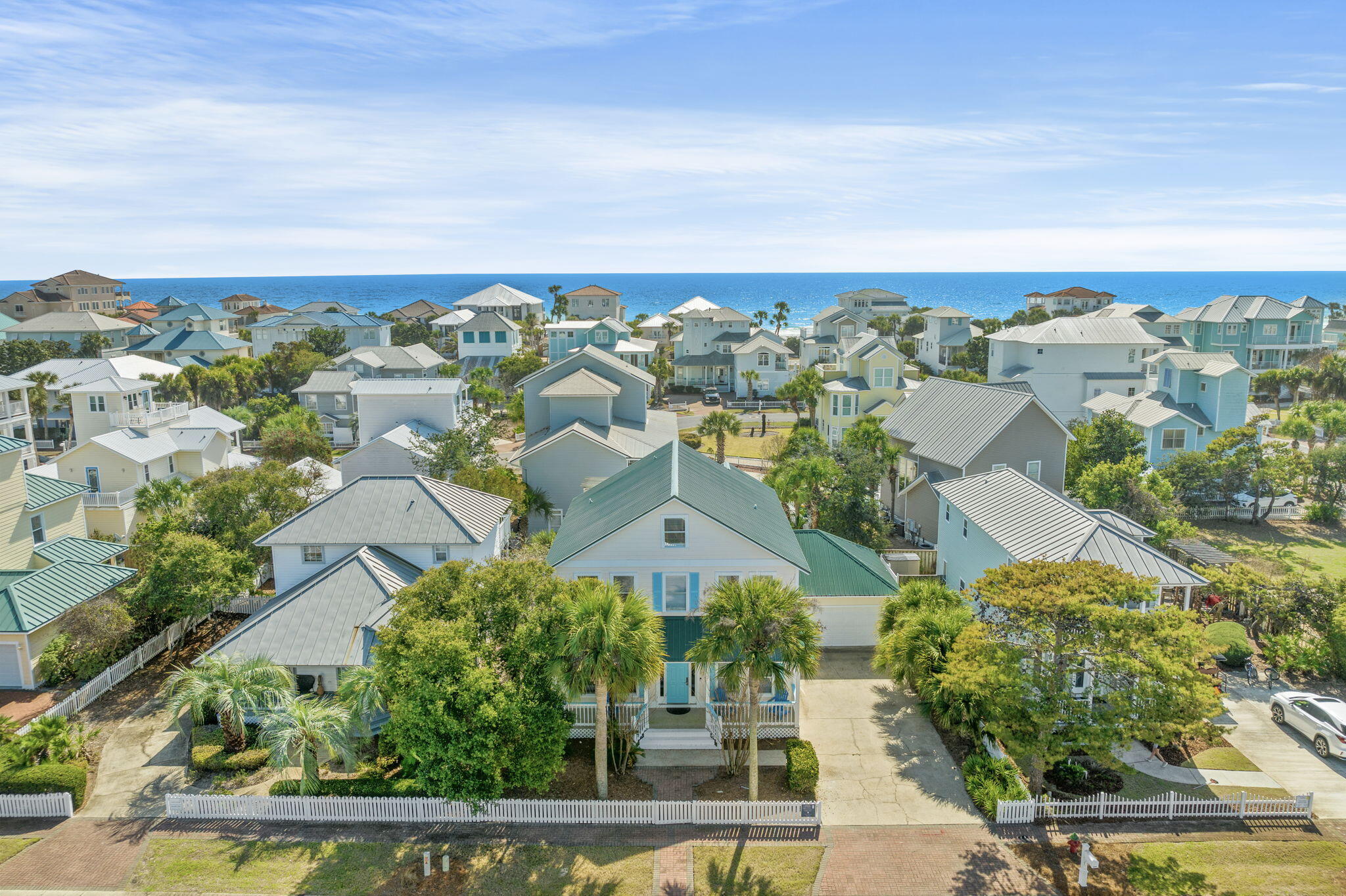 Priced to sell, this turn key rental machine w/ private pool AND community pool 150 feet away has it all.  2024 gross: $170K - with owner usage.  PM Projections are up to $249K. 

Convert garage into a game room for increased revenue $$. One block from the white sandy beach, this quintessential beach house is newly remodeled & spacious. This beautiful home is the ideal family beach house or investment property. Set behind a white picket fence in the heart of Crystal Beach, the brick paver sidewalk leads right to the front porch, two-car garage and generous driveway for parking. 

Open floor plan and many improvements made in the last 2 years.   Owner just installed brand new LVP flooring throughout first level.  Coastal theme with shiplap walls, updated coastal decor and comfy furnishings. There is wood and tile flooring throughout. Recent updates include new kitchen countertops and appliances, TVs in all bedrooms, indoor paint and more. Enjoy an indoor-outdoor lifestyle on the multiple balconies and spacious covered deck with lounge furnishings. There's ample space for hosting family and friends with six bedrooms and five full baths, including a large bunk room in the third-floor loft.

The airy master bedroom boasts a modern master bath with whirlpool tub, twin vanity and walk-in shower. It's the perfect haven to start and end each fun-filled day. Pavers surround the oval pool providing a private space for barbecues, relaxing in the sun and cooling off with a dip. Just down the street is a community pool for meeting new friends and neighbors.

A two-minute walk or bike ride away is the public beach access and the chance to ride bike trails along Scenic 98.