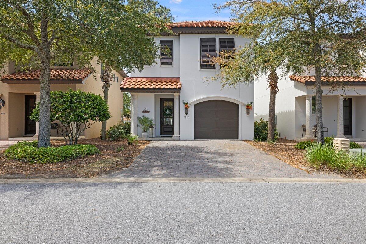 GOLF COURSE LIVING IN SANDESTIN! This exceptional property is perfectly located on the 5th hole of the Baytowne Golf Course at The Sandestin Golf and Beach Resort. Enjoy stunning fairway views and seasonal fireworks from your private screened patio or second-story balcony. Inside, the home is a modern beach oasis, featuring white quartz countertops, open shelving, and stainless steel appliances in the designer kitchen. The inviting living area includes custom features for enhanced comfort. Upstairs, find the primary suite, two spacious bedrooms, and bonus office space. A one-car garage and a 6-seater golf cart are included. Easy access to the community pool!