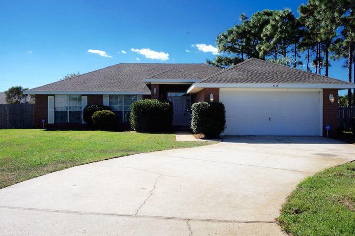 Welcome home to this perfectly located east Navarre retreat! Have peace of mind with a roof and water heater installed in 2015 and a new HVAC system less 6 months old, ,and a brand new lawn pump installed this year! Conveniently located at the end of a quiet cul-de-sac just minutes from Navarre's gorgeous beaches, a short commute to Hurlburt Field, and an even shorter walk or bike ride to Navarre High School, the YMCA, and the NYSA where you'll find wonderful community amenities. This all brick beauty features four bedrooms and two bathrooms in a split floor plan on a large lot! Enter the front door and you'll find closet storage at the entryway as it opens to the spacious living room. One bedroom is located off the living room perfect for a 4th bedroom, office, playroom, or man cave! Down the hallway you'll find two more bedrooms and a shared bath. The kitchen is open to an eat in kitchen space and features plenty of white cabinets along with a designated pantry. From the kitchen you'll enter in the interior laundry room that leads to the garage. The master bedroom is great sized and the master bath showcases double vanities, a shower/tub combo, private water closet, and a walk in closet.