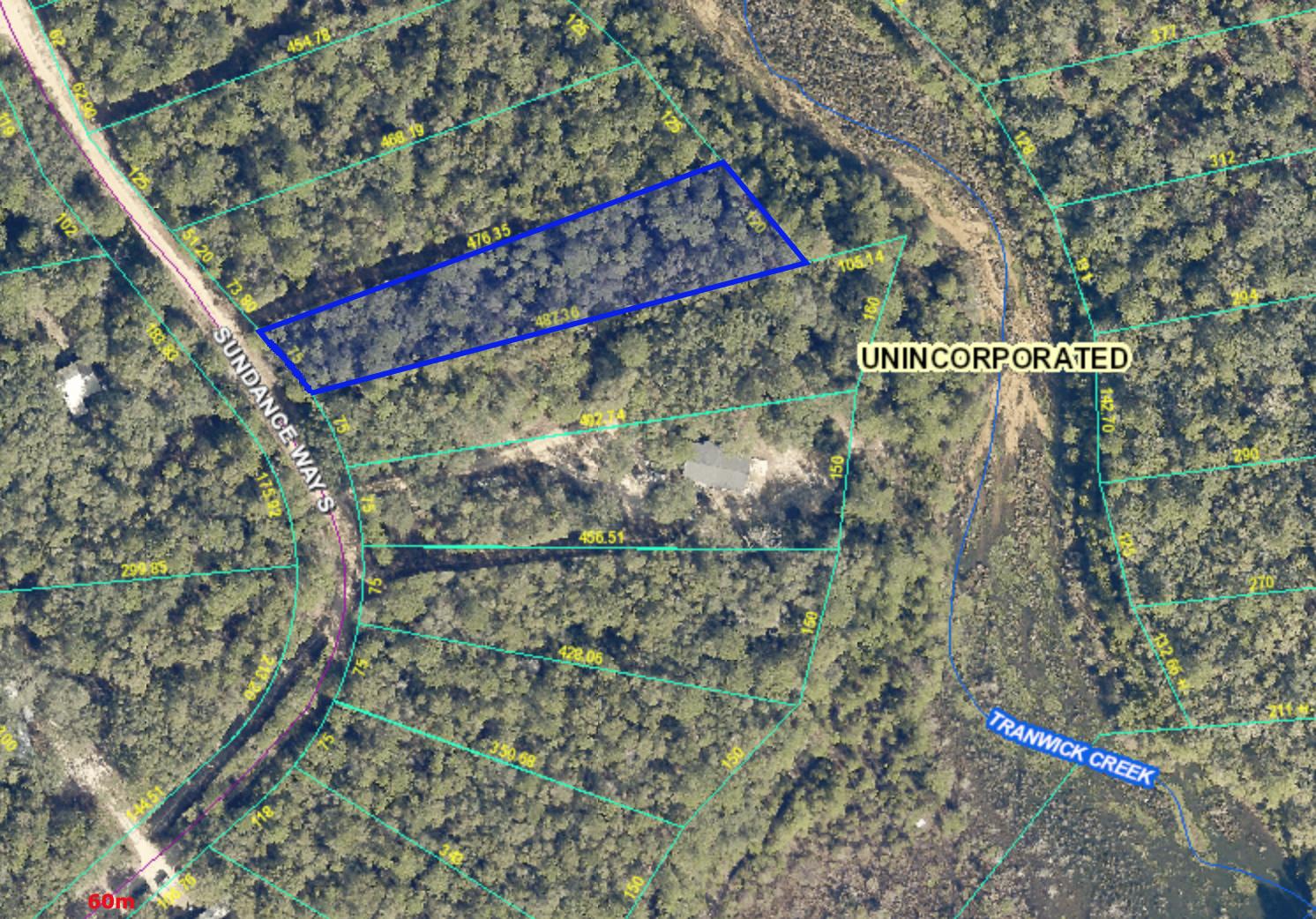 1 Acre on Tranwick Creek in Holt, FL and less than 2 miles from the I-10 exit at Holt. Build your home or make this your weekend retreat! Mobile Homes are allowed.