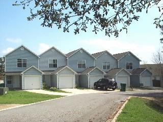 Two story townhome with a one car garage. Both bedrooms are upstairs with their own private full bathroom. Half bath downstairs. Lawn service and pest control included. Back yard is open and shared with the complex.  Sorry , no pets.