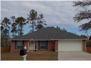 LOOK NO FARTHER! This Spacious, Well Kept, All Brick, Split Floor Plan, 4B/2BA, home is JUST WHAT YOU'VE BEEN LOOKING FOR! South of I-10,yet conveniently located minutes away from shopping, fine dining, and an easy commute to Eglin AFB, Duke Field, and 7th Group Special Forces. This home has formal dining adjacent to fully appliance island kitchen,with hop-up breakfast bar which opens into the large family room w/fire place, the perfect setting for family activities and relaxation. You will love the large custom built multi-level deck,w/decking around sparkling above-ground pool which creates an atmosphere for fun in the sun, BBQs, and those family and friends gatherings! Master suite has TWO-AT-A- TIME privacy design, w/double vanity, garden tub and HIS&HER walk-in closets.
OTHER . . . amenities includes, family room ceiling fan w/remote control, plus ceiling fans in all bedrooms, security system, wood laminate flooring thru-out home with tile flooring in wet areas. Custom window treatments, gas fire place, garage door opener w/remotes. Additional bedrooms are of nice size with ample closet space. Yes, this home is worth seeing worth owning. DON'T DELAY, CALL FAYE TODAY!