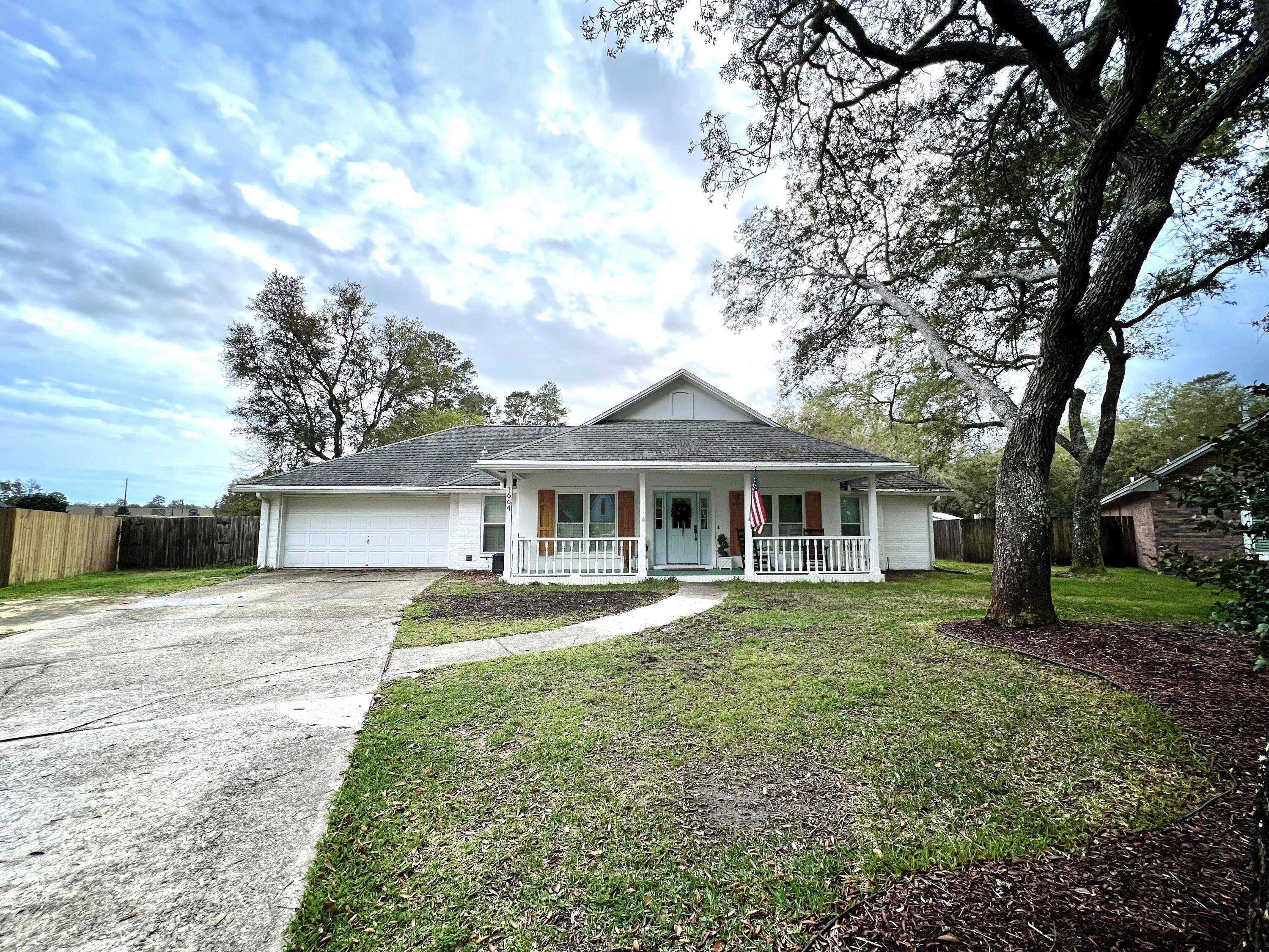 Available for move in July 1st. Beautiful three-bedroom home with an office located in Bluewater Bay's very popular Parkwood Estates. Large family room has a wood burning fireplace and built in bookcases. The split floor plan ensures privacy. The primary bedroom includes a newly renovated bathroom that is just perfect. Bar seating in the open kitchen provides the extra seating if needed. The office/den features French doors for added privacy and has a beautiful view of the front yard. The spacious backyard borders Bluewater Bay Elementary School and Fred Gannon Rocky Bayou State Park. Additionally, the backyard includes a large, screened in back patio.  No smoking.  Pets are allowed with owner approval and pet fee. Text Tiffani 850-797-0681 for more information or to view. 24hr Notice