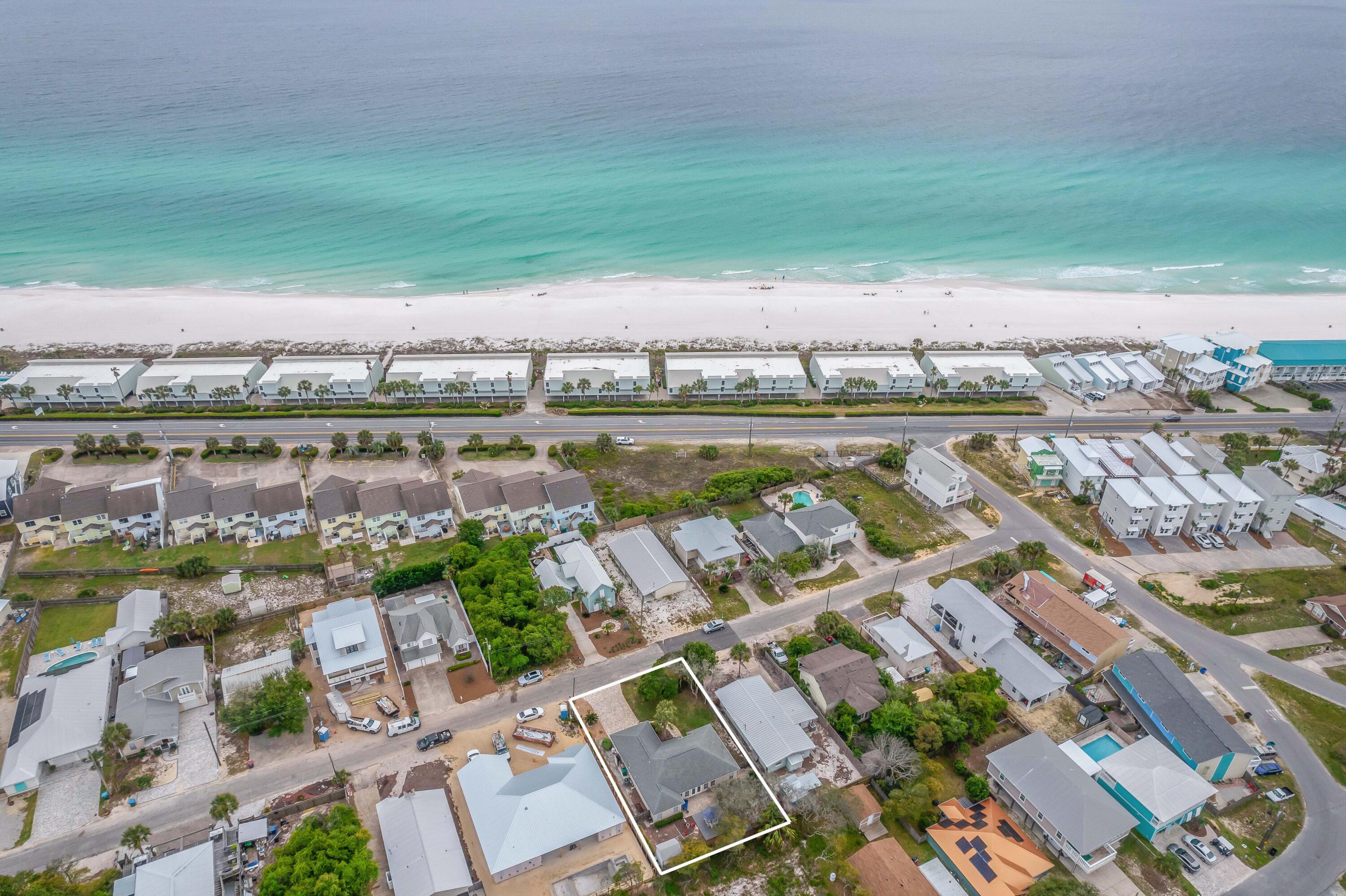 WALK TO THE BEACH! NO HOA! SHORT TERM RENTALS ARE ALLOWED! This 3 bedroom, 2 bath, single story home has been lovingly cared and it shows. Open the door to coastal colors, an open layout and natural light pouring in. Step outside to your fenced in back yard, with expansive patio and pathways; ready to make this your outdoor oasis. New plank flooring, quartz countertops, sink, backsplash, outdoor deck, and paver drive all new in the past year. Roof, master bath, hot water heater all new 2014, and HVAC new 2018. 43 Gulf View Drive is WEST Panama City Beach and only minutes to Inlet Beach and all Scenic 30A has to offer. Pier Park and Panama City Beach Airport are only a short drive. Call today and make this your new full-time residence, your home away from home or your rental investment!