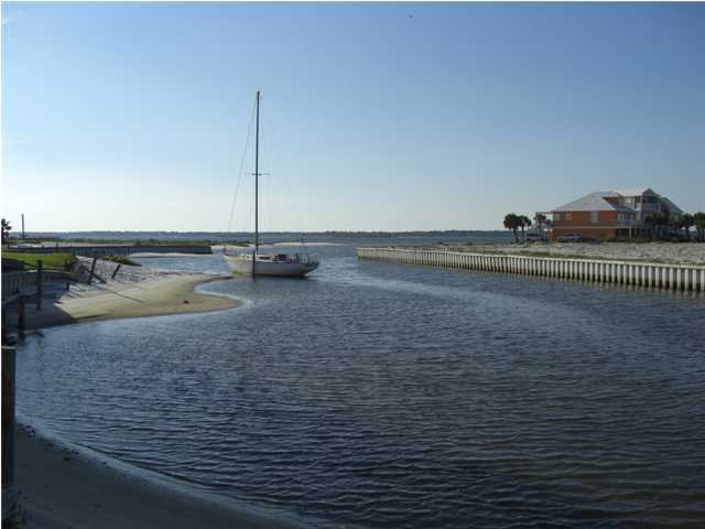 This Caribbean style community offers fantastic location with this beautiful lot located just steps away from National Seashore, Gulf of Mexico, and International Waterways. Last subdivision on Navarre Beach with community pool and gated entrance. Build your dream home!