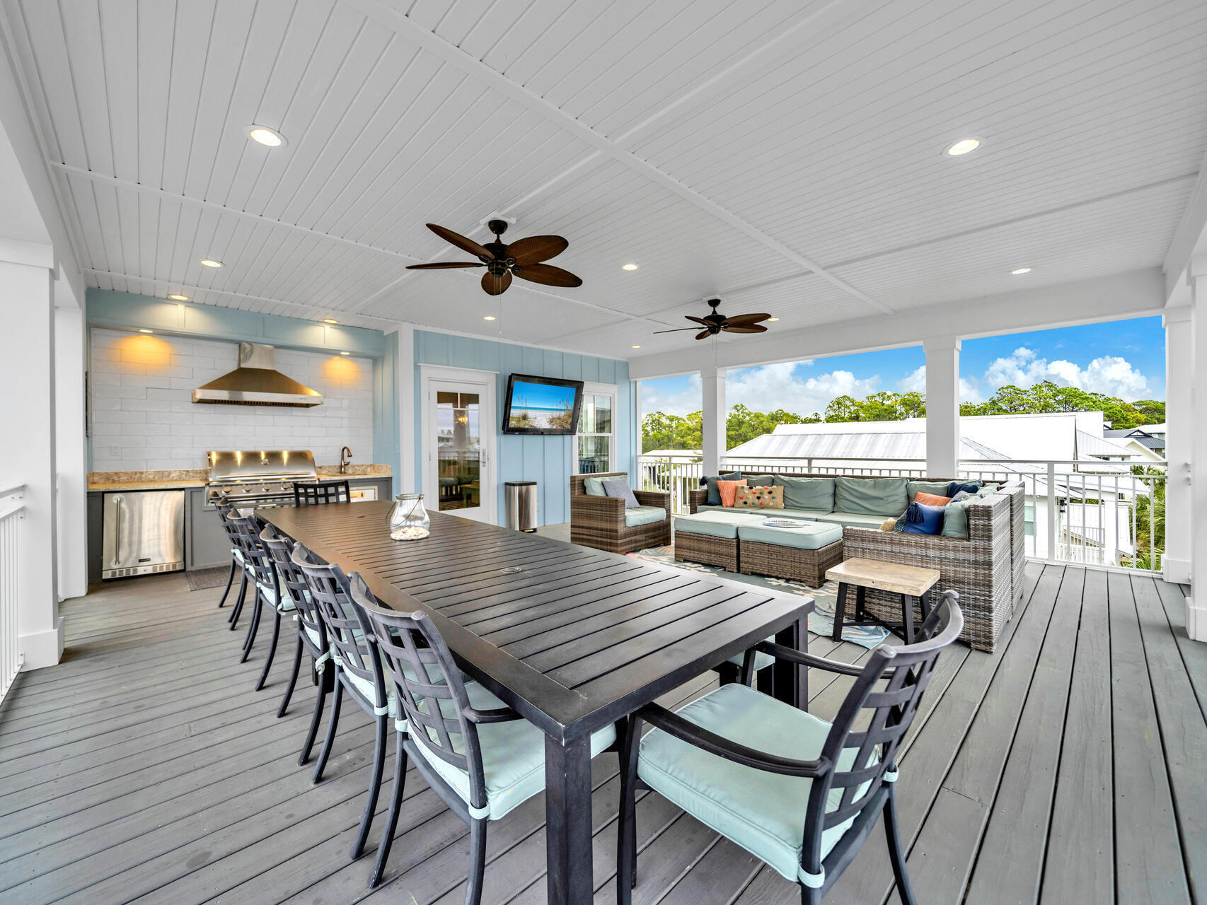Welcome to Cloud Nine! This spectatcular home is a RENTAL MACHINE!!! With $80k on the books already for 2025! This large custom beach home, built in 2016 is on a corner lot, spanning three stories and 2988 sq ft. Ideally located in the charming Seacrest Beach Community nestled between Rosemary and Alys Beach. Multiple indoor living spaces, and 5 porches offering outstanding outdoor living. The third floor outdoor kitchen, dining and living space is among the largest in Seacrest Beach at 550 square feet overlooking the palm-lined Seacrest Beach Blvd. As you enter  the home from Endless Summer Way from the front porch there is a foyer and a bedroom on one side with an ensuite bathroom. Across the foyer is a powder bath. The fully equipped kitchen features Sequoia Quartzite counter tops and stainless appliances. The second floor features 3 bedrooms that are arranged for maximum privacy. On the third floor you have a bedroom with two queen beds and a lovely juliet balcony overlooking the Seacrest Beach nature preserve. The 4th full bath is off the third floor hallway. A second large living/rec room is on the 3rd floor with a bar and beverage fridge for end of the day drinks. Step out the door to the spacious outdoor kitchen, dining and living area. Paradise awaits!