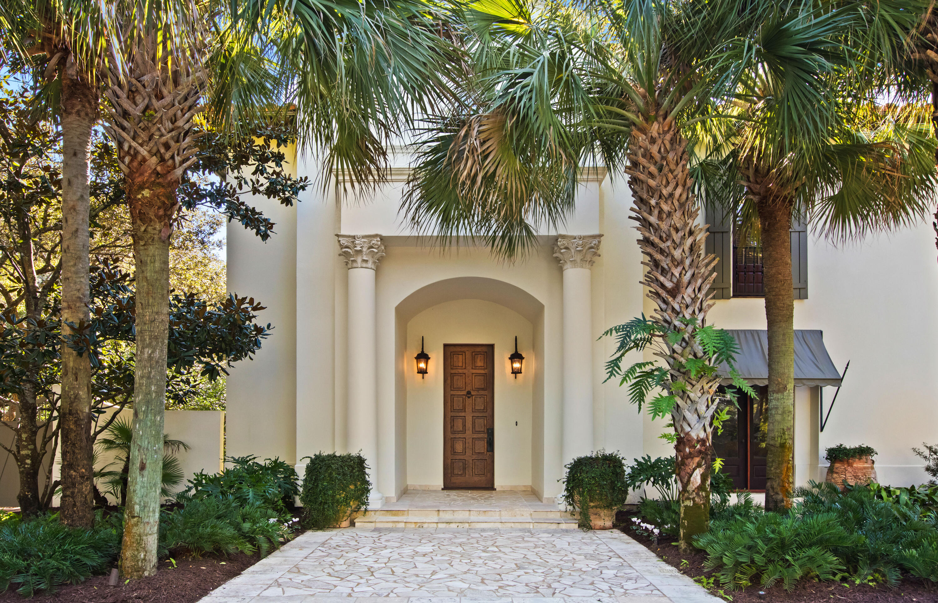 Nestled along the prestigious Emerald Coast, this exceptional property offers an unparalleled blend of elegance, privacy and convenience. Located in a highly sought-after private, non-rental community with only 18 homesites, this home provides a serene and exclusive lifestyle just steps away from the pristine white sands and emerald waters of the Gulf of Mexico.

The main residence has been designed to combine coastal charm with modern functionality. With three spacious bedrooms and three and a half baths, this home provides ample space for family and friends while maintaining a sense of luxury and comfort. High ceilings, luxurious finishes and an abundance of light create an inviting and sophisticated atmosphe Adjacent to the main residence is a fully equipped carriage house, offering a separate entrance for enhanced privacy with one bedroom, living area and kitchen. This versatile space is perfect for guest accommodations or multi-generational living.

The outdoor amenities are nothing short of extraordinary. A large pool is surrounded by lush, professional landscaping, creating  a tranquil oasis ideal for relaxation or entertaining. Curated garden pathways with strategically placed lighting enhance the space, offering a magical ambiance that transitions seamlessly from day to night.

Situated within Little Redfish Lane, this property offers not only a peaceful environment but PRIVATE BEACH ACCESS Whether paddle boarding, beachcombing or simply enjoying breathtaking sunset views, the Emerald Coast is your backyard.

This home represents a rare opportunity for discerning buyers. It's perfect as a primary residence, a second home, or a legacy property, with significant long-term investment potential in one of the most exclusive areas along the coast.
