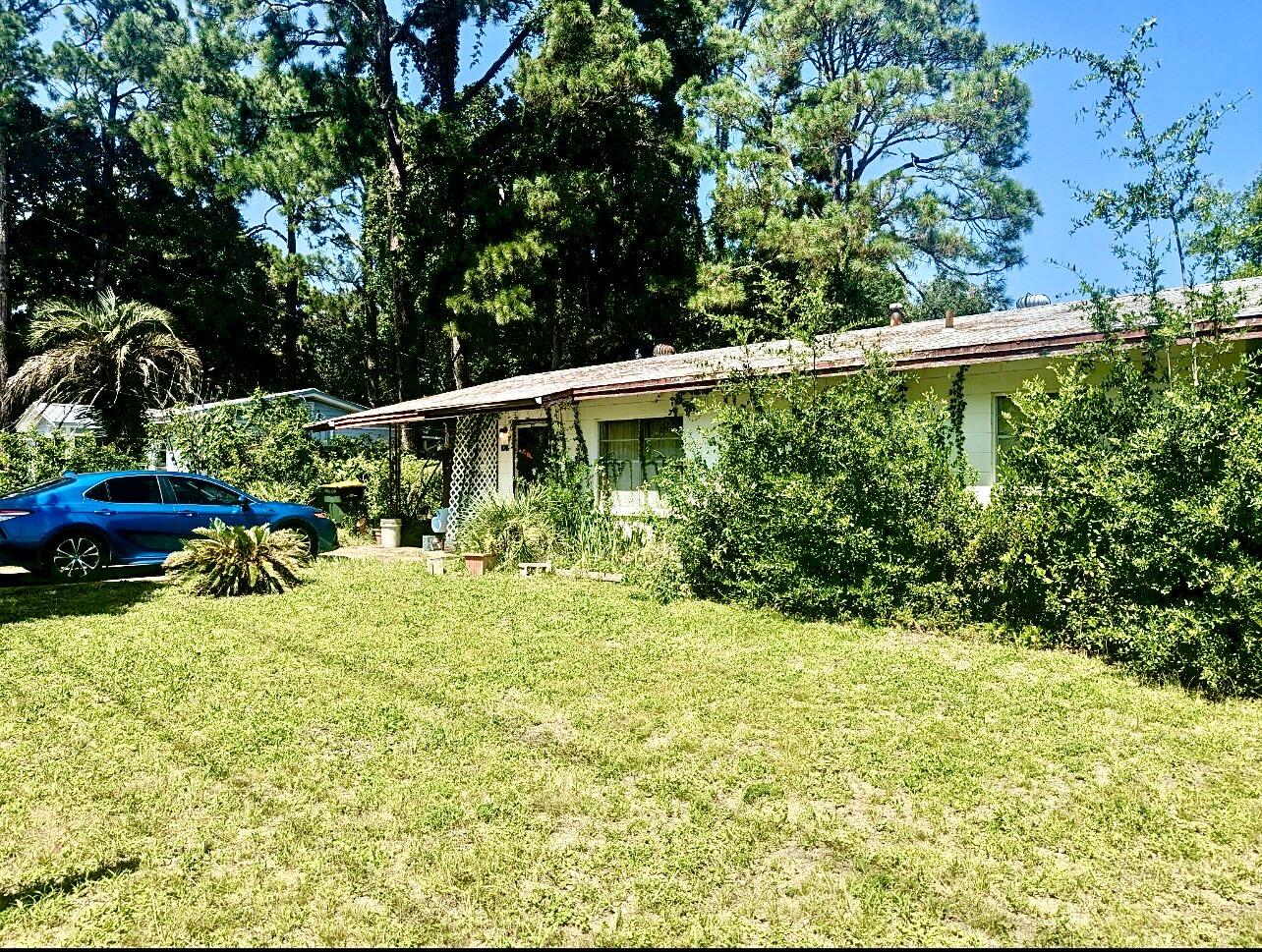 INVESTORS!!!!  Concrete Block Home with a great lot.  Home is occupied, so appointments are necessary with a 2 hour notice!!!