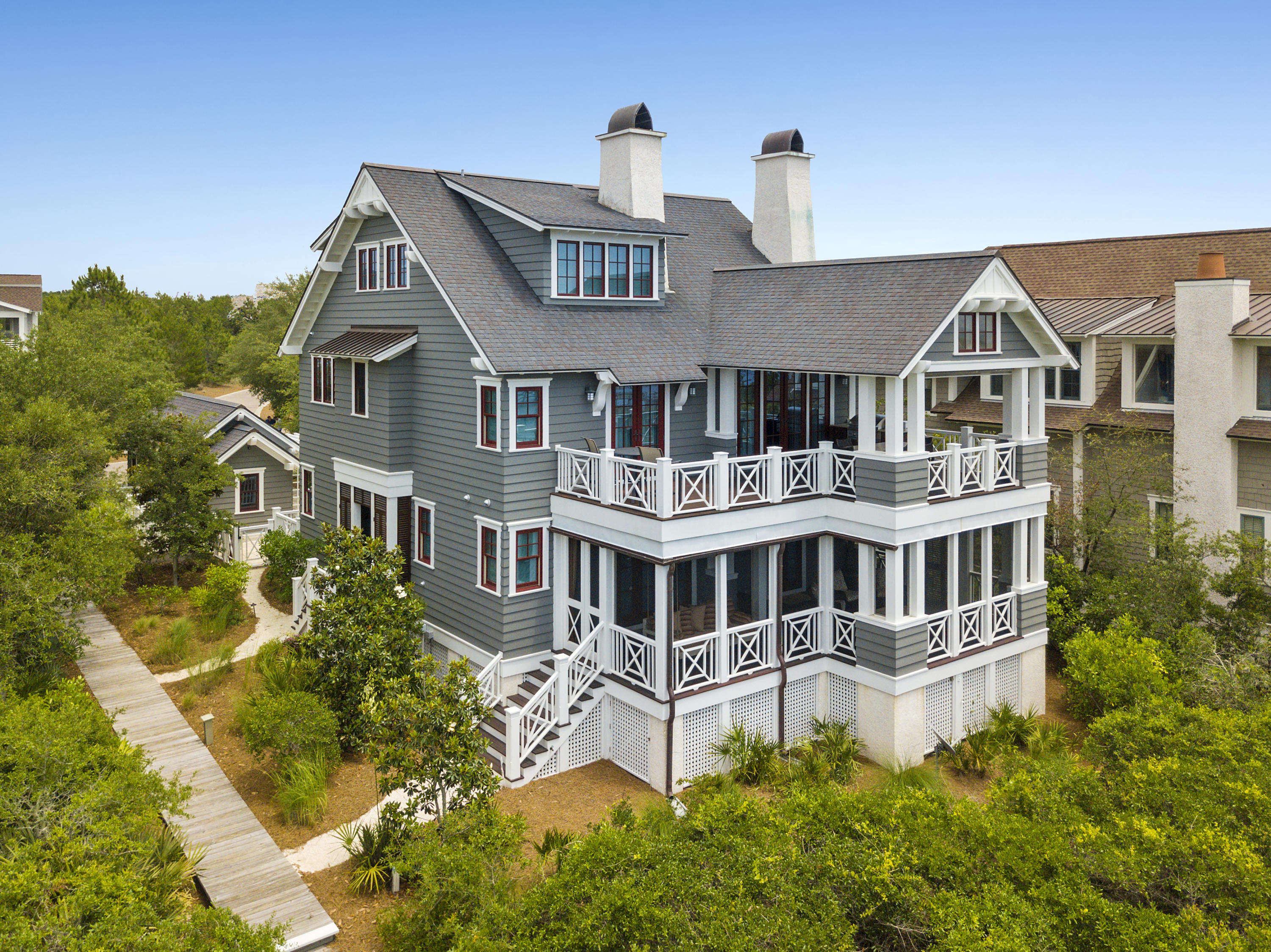 Exceptional lake front home in WaterSound Beach with gorgeous views of the Gulf of Mexico! This TS Adams designed home is thoughtfully laid out & comprised of only the finest materials. It includes 5 bedrooms, 4.5 baths & a bonus room and is being offered fully furnished & turn key. An inviting courtyard with a private pool & outdoor fireplace welcomes you into this luxury residence and leads to the 1st floor family room, 3 guest bedrooms with en suite baths and a covered rear porch with serene views of Camp Creek Lake & the gulf dunes. The 2nd floor includes the master suite, main living room, dining room & kitchen as well as another large porch that offers spectacular views of the lake & beaches! The fifth bedroom, a bonus room and a storage room complete this fine home on the 3rd floor. Luxury finishes abound throughout this home with numerous features including a mahogony front door, reclaimed White Oak wide plank floors, shiplap walls, a gourmet kitchen with a gas range, multiple gas fireplaces, Rinnai tankless water heaters, Lennox HVACs, Weathershield Windows and Doors, brass plumbing fixtures, IPE decking, heated master bath limestone floors and even an elevator that goes to all 3 floors!  The home is wired throughout for smart home living via a Control 4 System which controls lighting, audio/video, surround sound speakers and a security system. Built by Gulfview Contruction, this home has everything a discriminating buyer could possibly want in a luxury beach residence along Scenic 30a.  Contact us today for more information and to arrange a private showing!